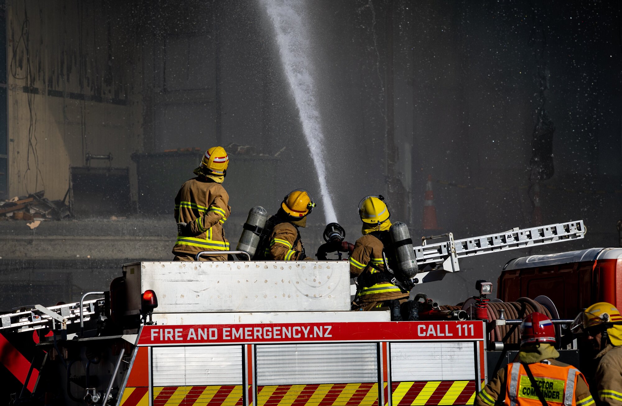 Thick black smoke engulfed the area after the fire broke out at New World Victoria Park yesterday. Photo / Dean Purcell