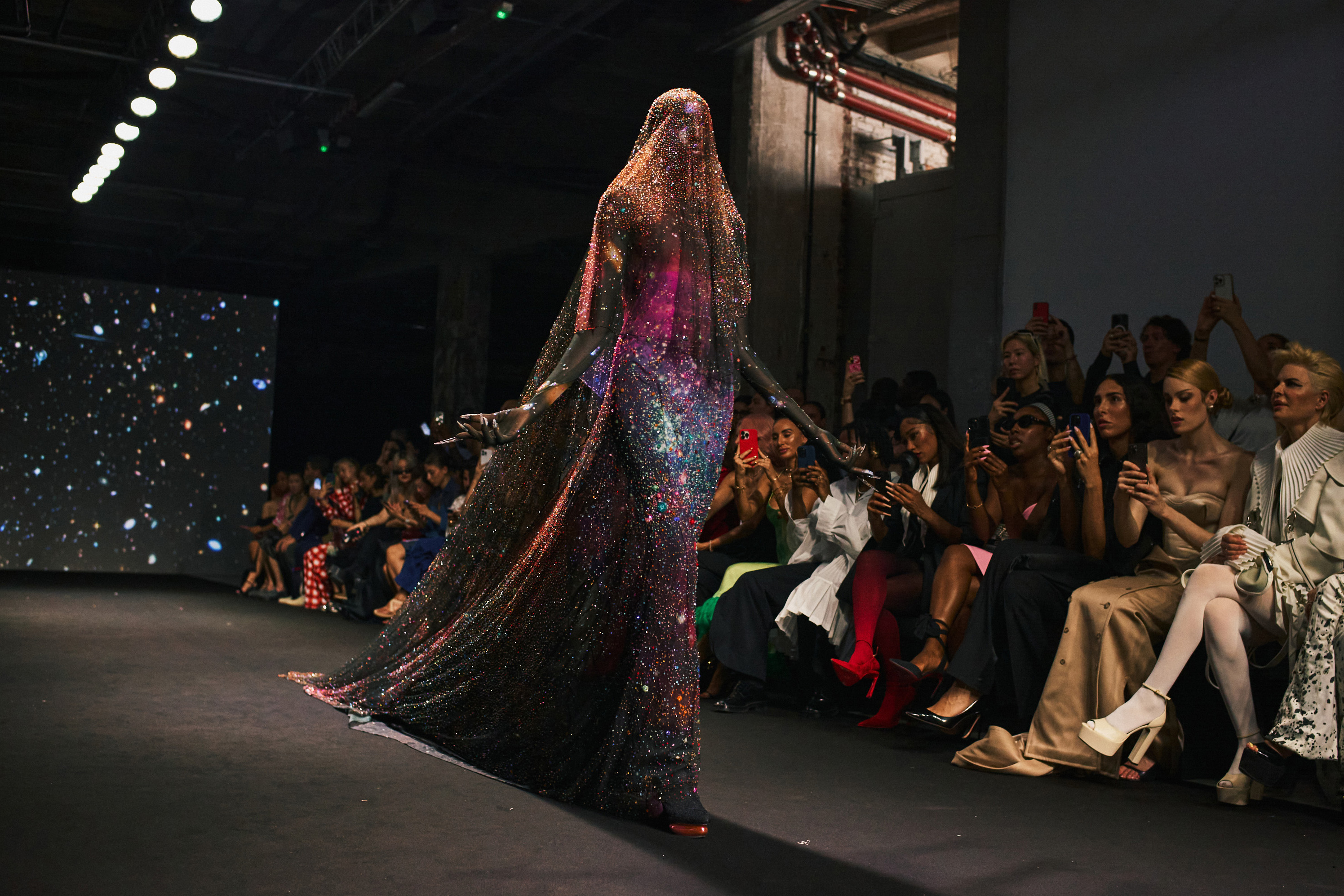 The final outfit at the Robert Wun show, a dress that conjures the cosmos. Photo / New York Times