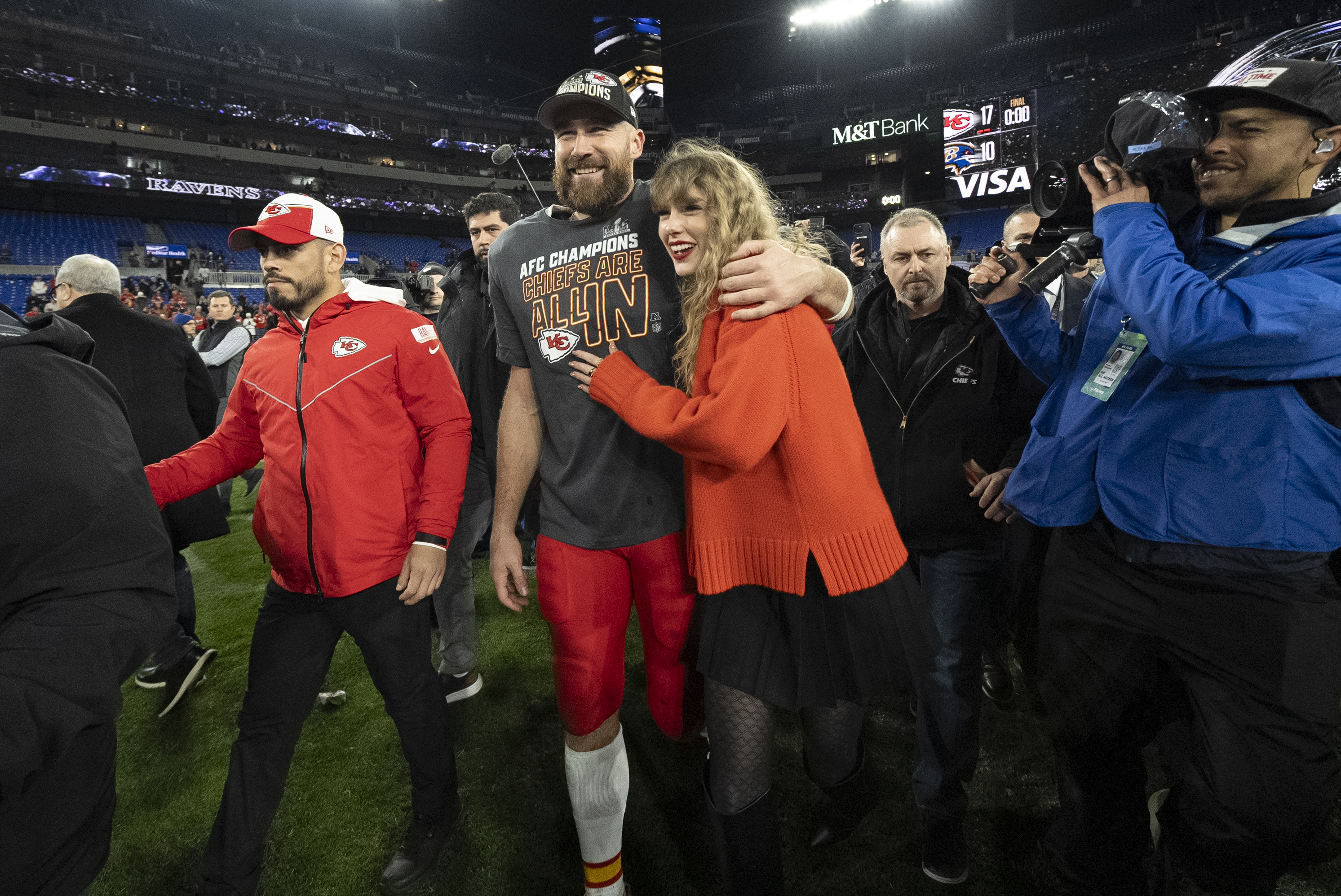 Kansas City Chiefs tight end Travis Kelce walks with Taylor Swift following the AFC Championship NFL football game. Photo / AP