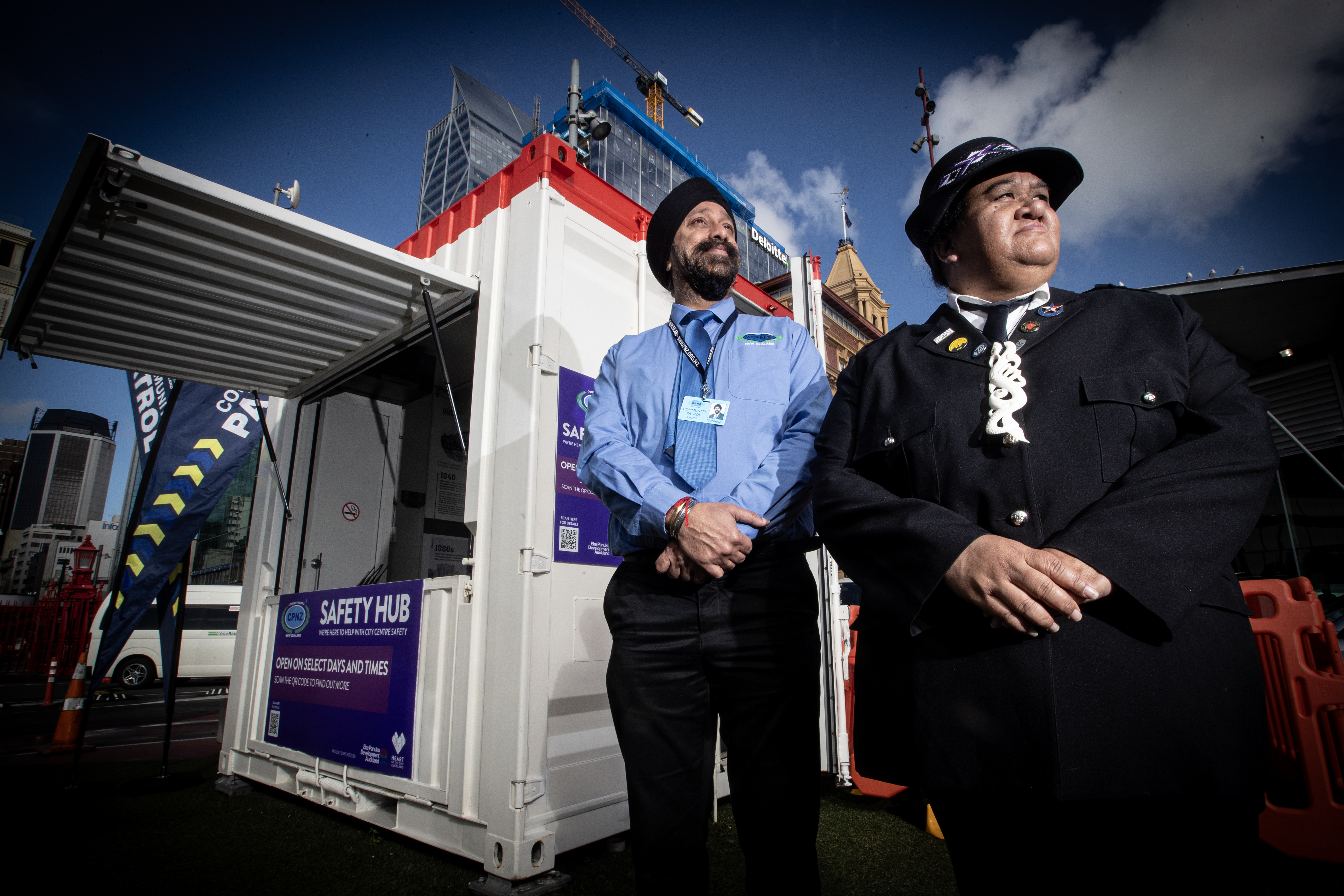 Community Patrols of New Zealand's Gurdeep Talwar and Māori Warden Joanne Paikea stand in front of the safety hub in Queens Wharf. Photo / Jason Oxenham