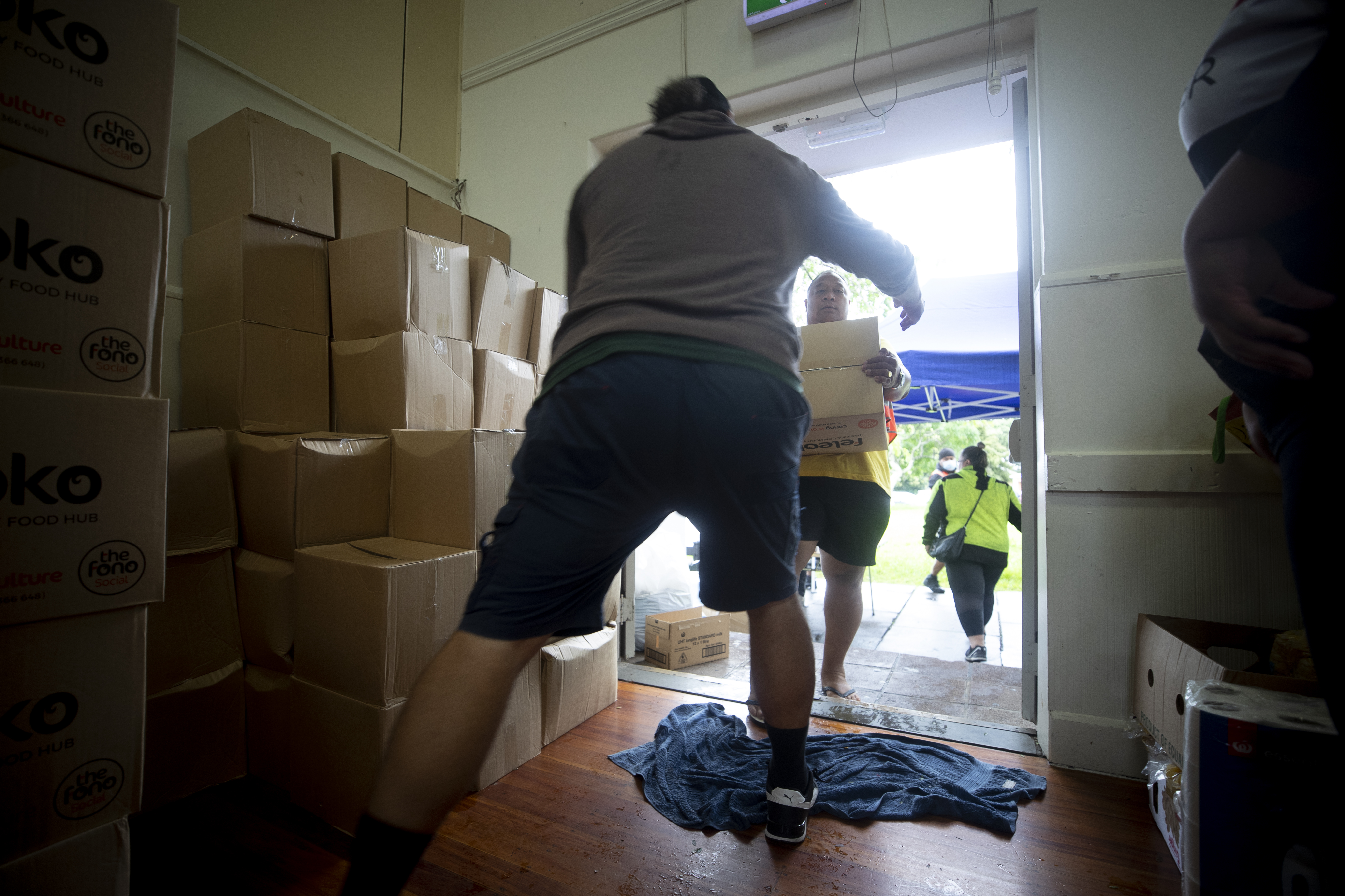 Volunteers, support services and Auckland councillors initially set up a flood-recovery base of operations at the Māngere Memorial Hall. Photo / Dean Purcell