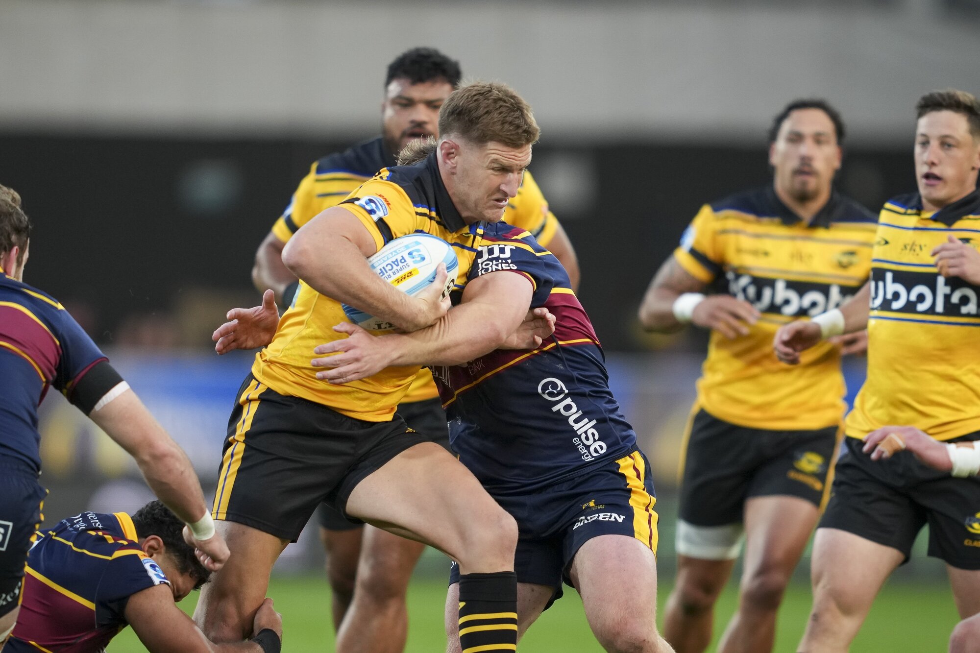 Hurricanes midfielder Jordie Barrett carts the ball into the Highlanders defence, in Dunedin. Photo / SmartFrame
