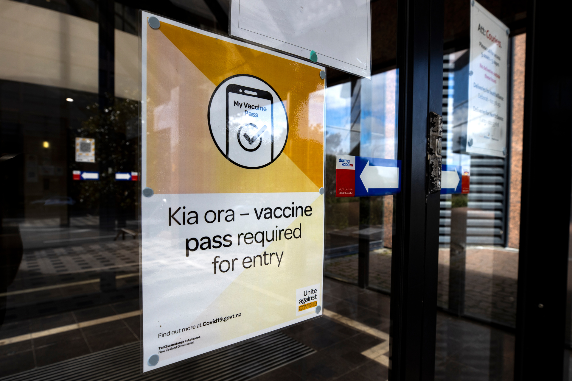 Businesses put up signs to notify people of the need for a vaccine pass for entry. Photo / Brett Phibbs