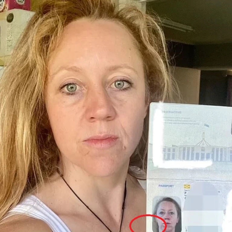 There was a small nibble mark on Lindsey Gray's passport.