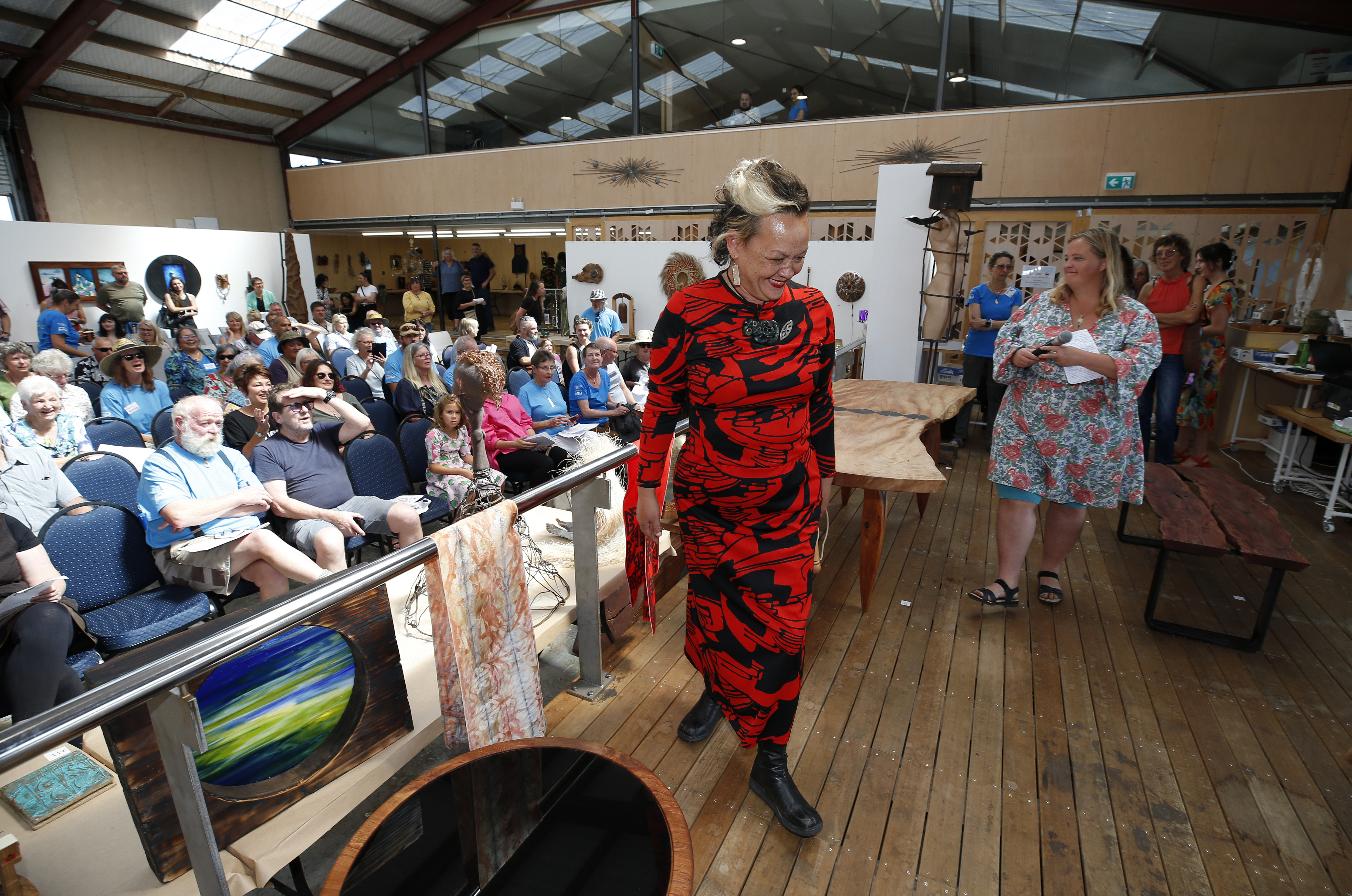 Artist Andrea Hopkins opens the auction up for bidding at the Hihiaua Cultural Centre. Photo / Michael Cunningham.