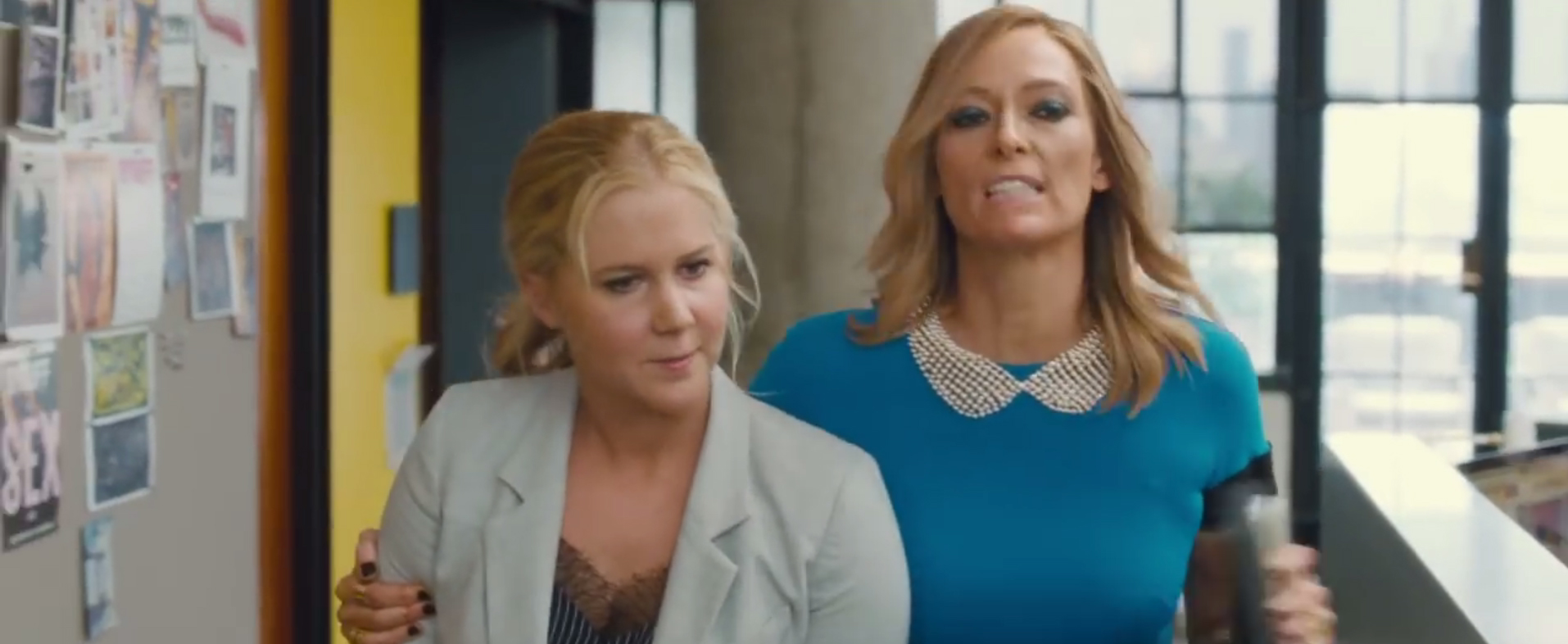 Amy Schumer and Tilda Swinton in a scene from the movie Trainwreck.