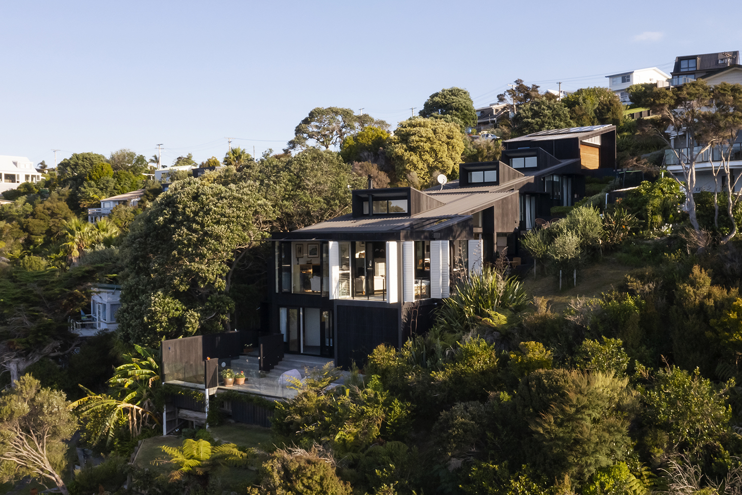 Each level of the home opens up to its own courtyard. Photo / Sam Hartnett