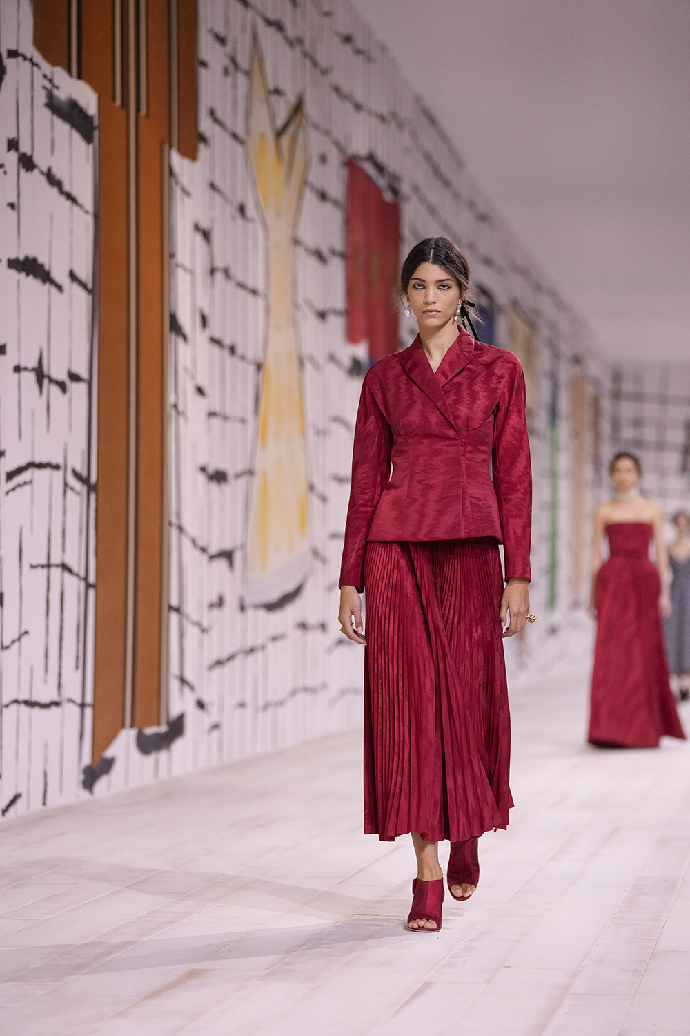 For the backdrop of Dior’s haute couture spring/summer collection, Maria Grazia Chiuri commissioned a series of enormous murals from 94-year-old artist Isabella Ducrot. Photo / AP