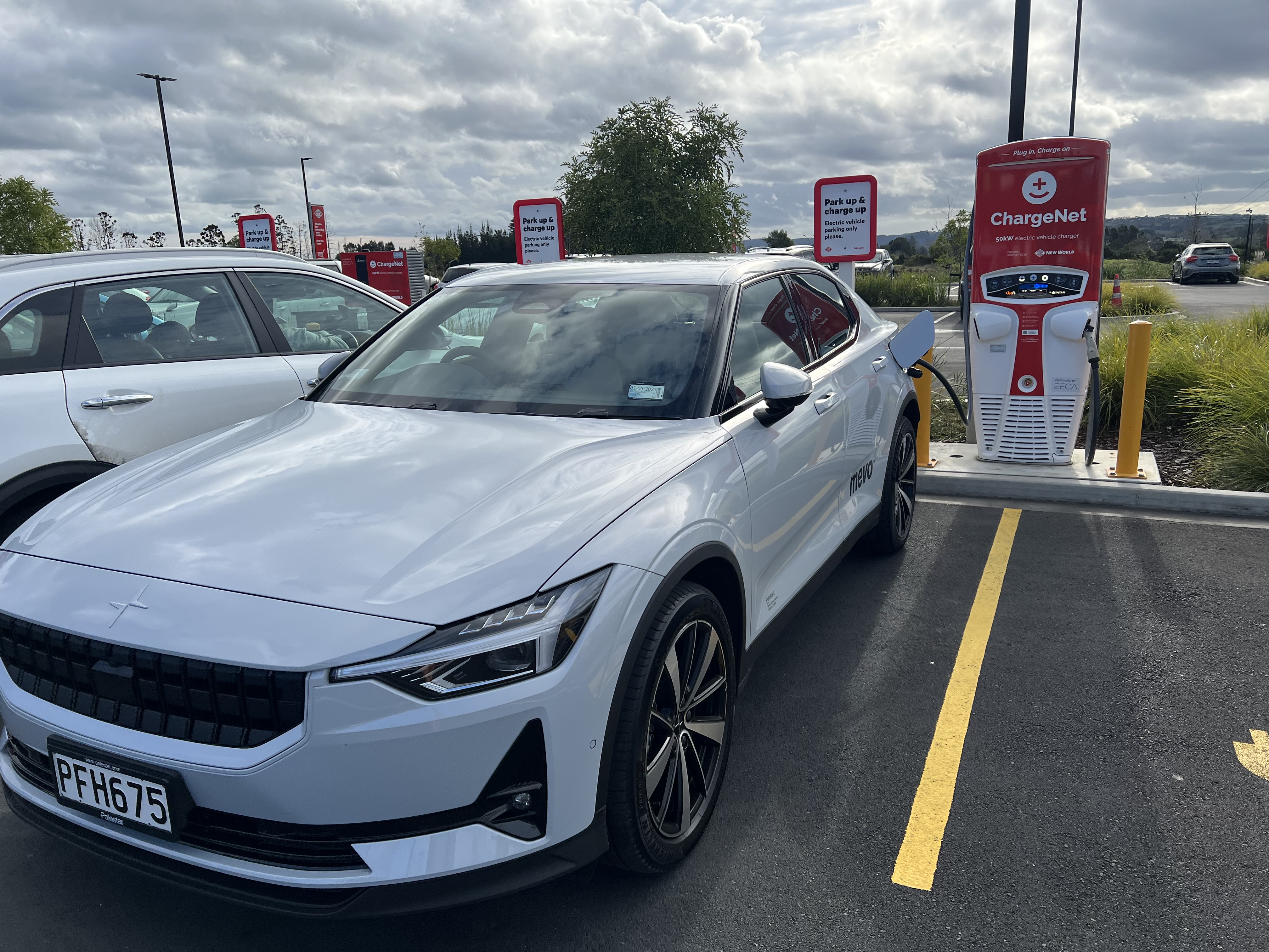 A Polestar EV, operated by Mevo, at a ChargeNet station. Public fast chargers cost a lot more than topping up at home. Photo / Chris Keall