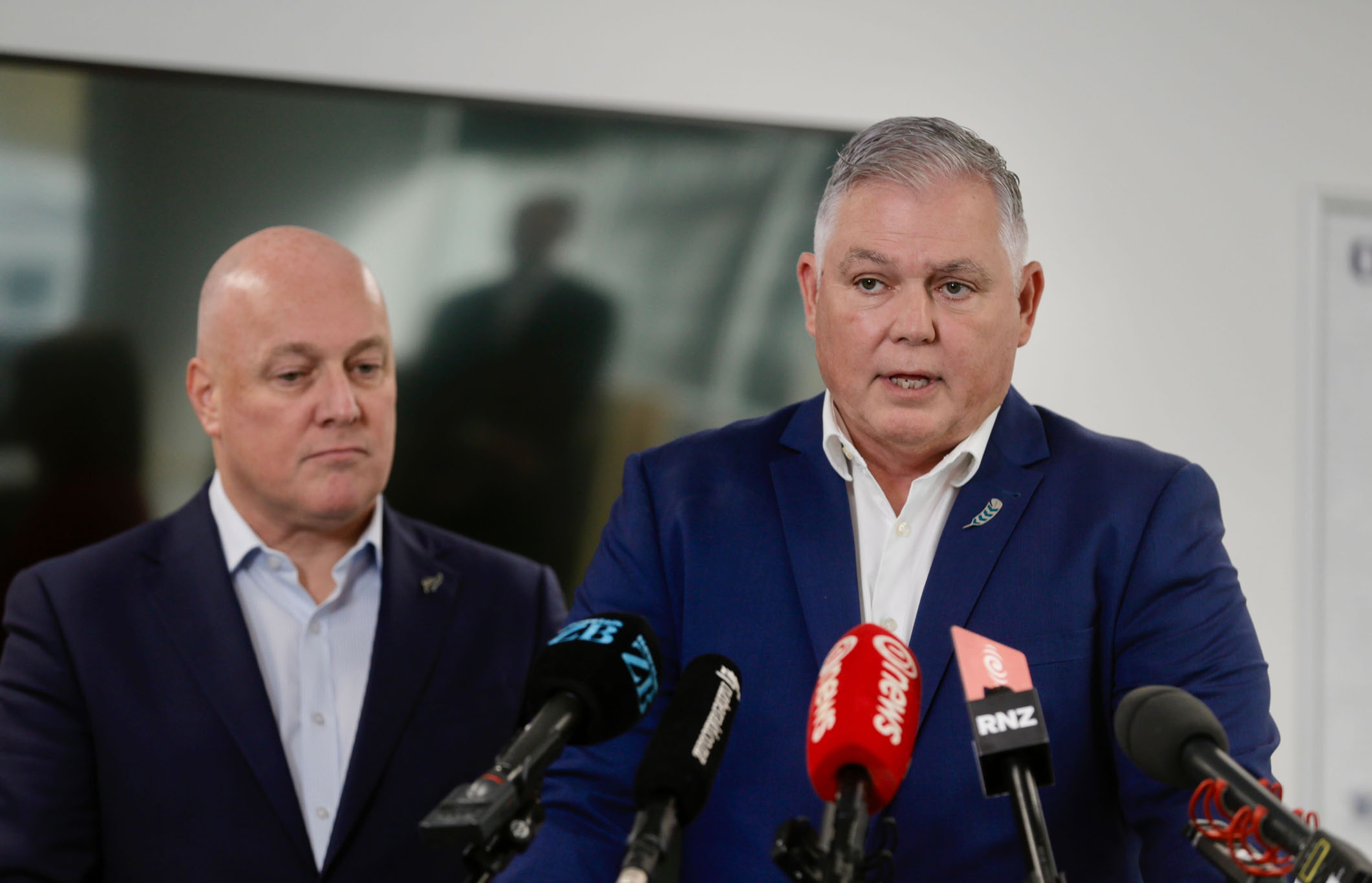 Prime Minister Christopher Luxon and Police Minister Mark Mitchell spoke from Auckland Central police station. Photo / Alex Burton