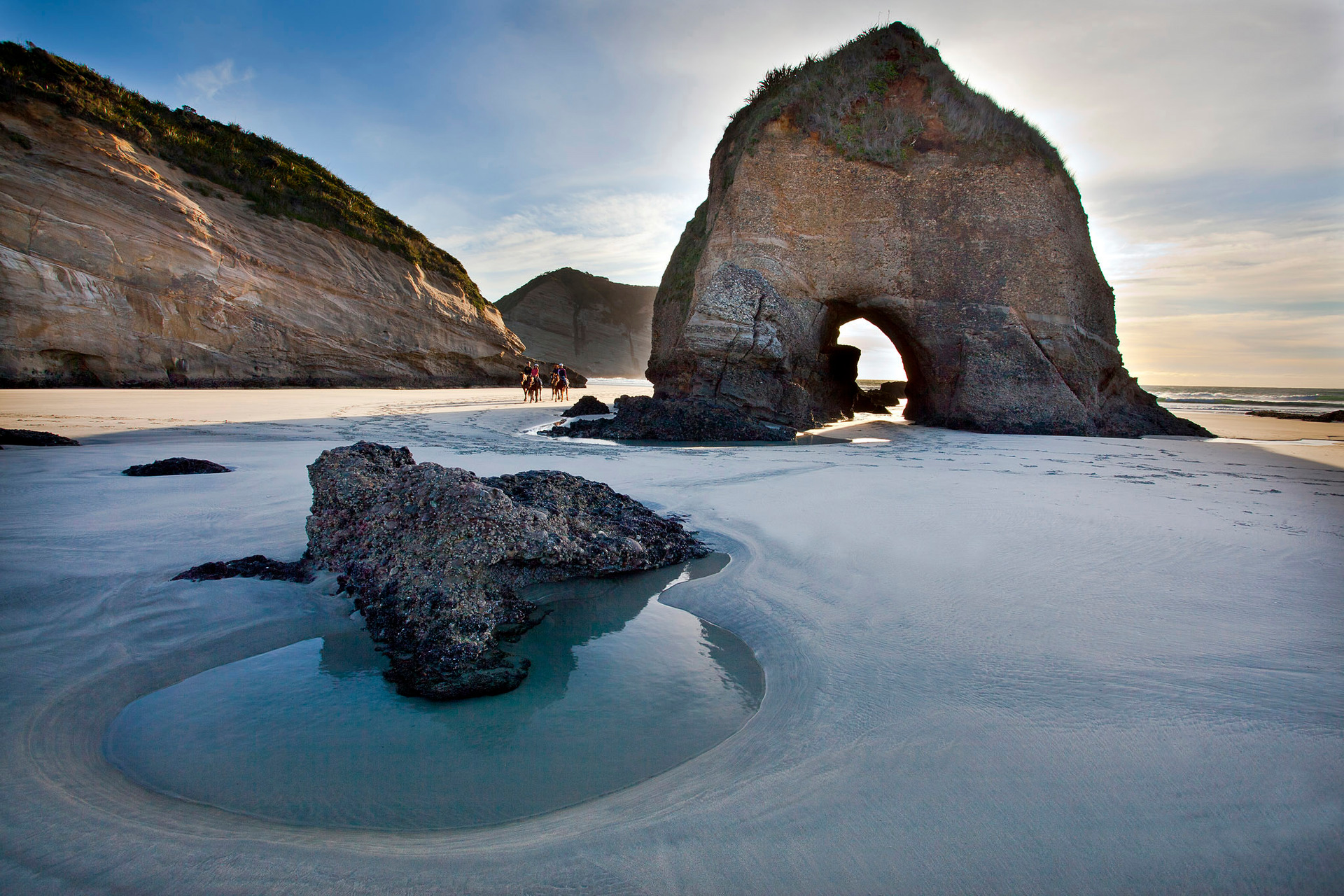 The stunning Wharariki Beach is one of the highlights when visiting Golden Bay. Photo / Cape Farewell Horse Treks