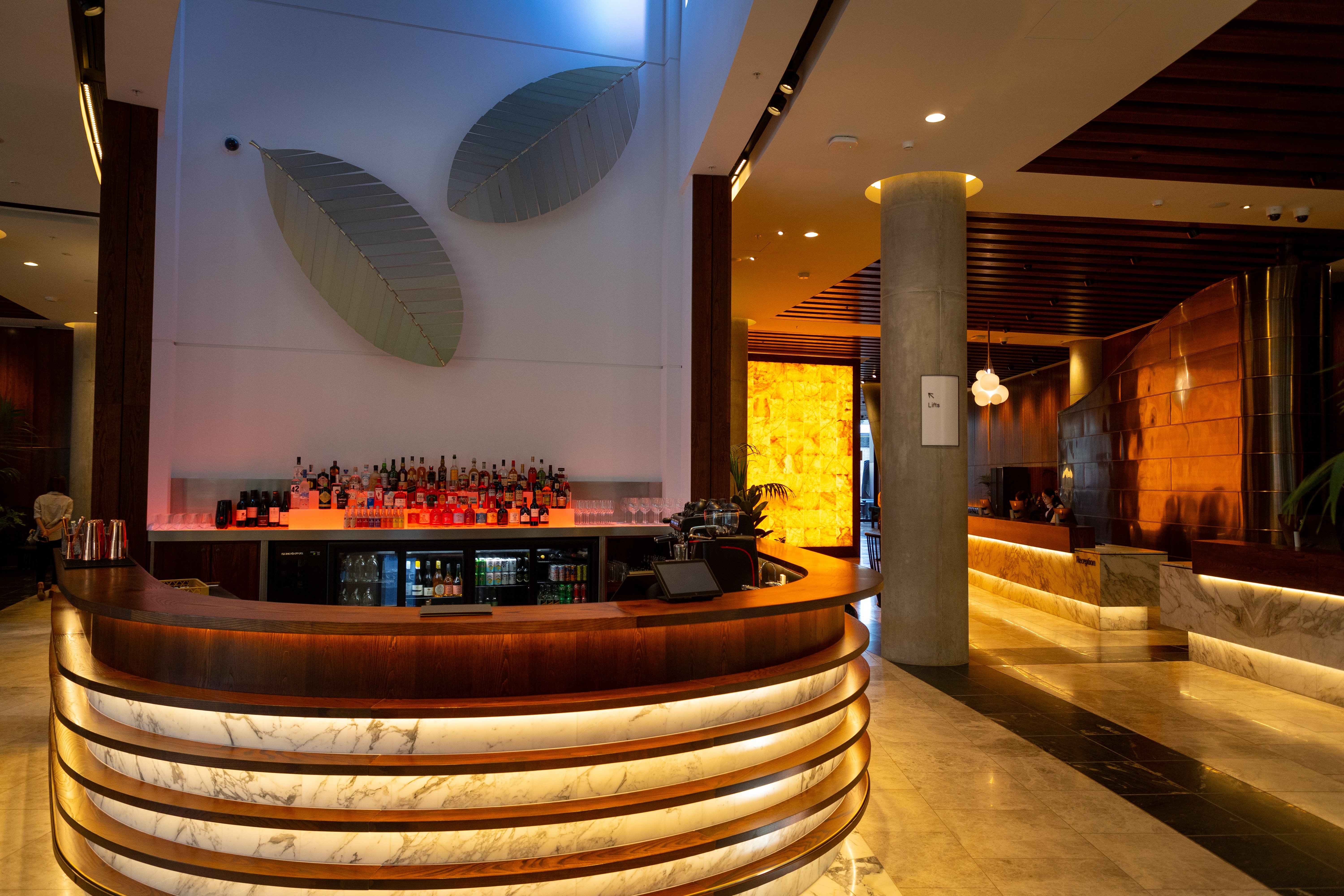 Onyx Bar inside the new Horizon by SkyCity hotel in Auckland - part of Gordon Moller's art work Transcendance can be seen on the wall behind the bar. Photo / Michael Craig