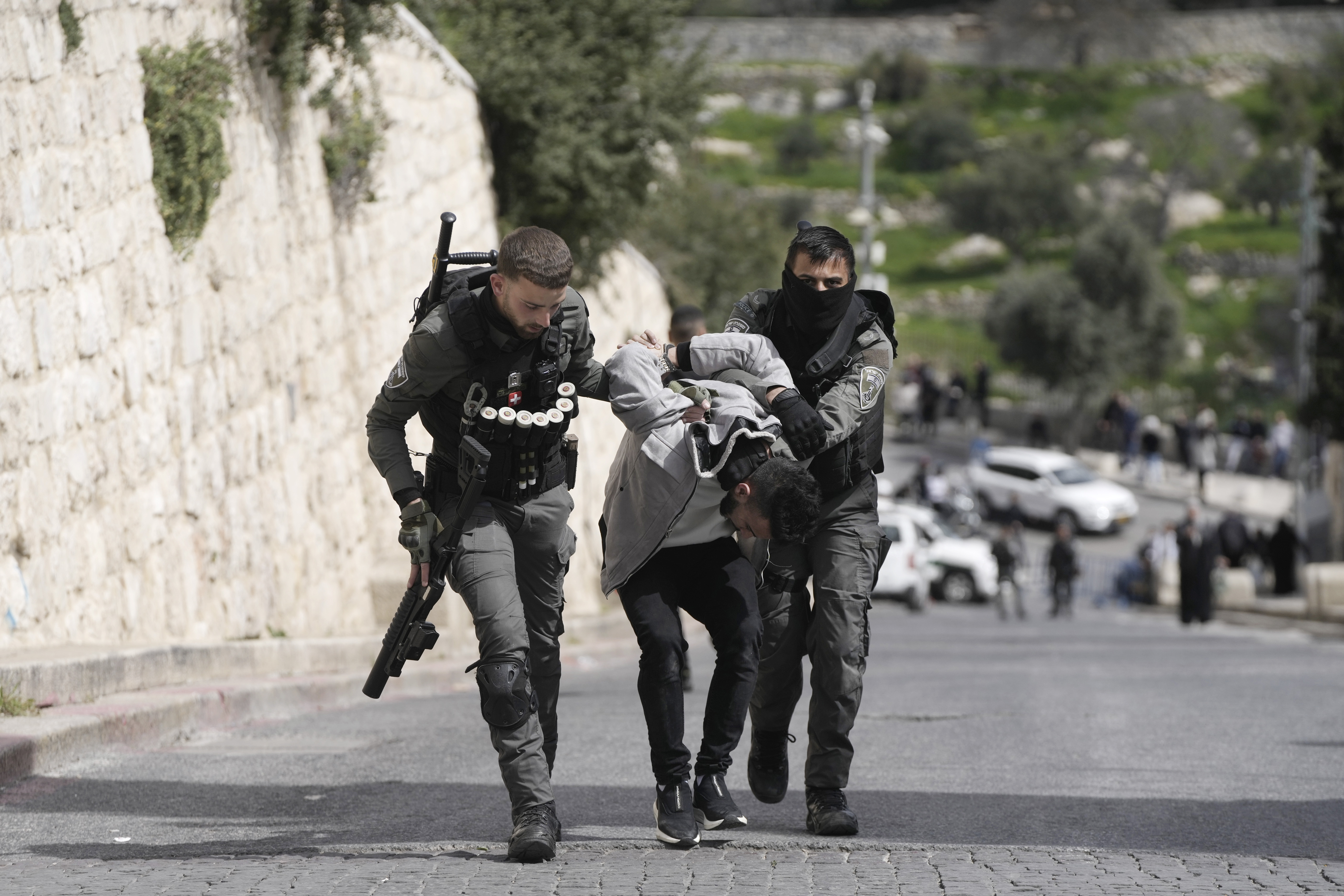 Israeli Border Police detain a Palestinian man ahead of Friday prayers at the Al-Aqsa Mosque compound in the Old City of Jerusalem. Photo / AP