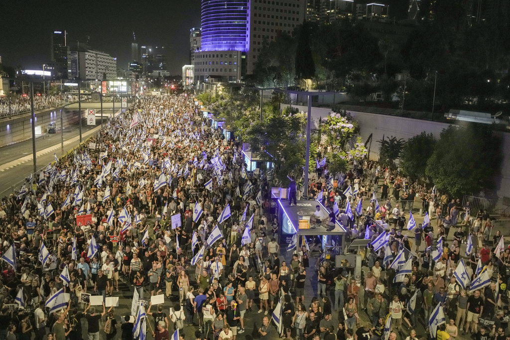 People protest against Israeli Prime Minister Benjamin Netanyahu's government and call for the release of hostages held in the Gaza Strip by the Hamas militant group, in Tel Aviv, Israel. Photo / AP