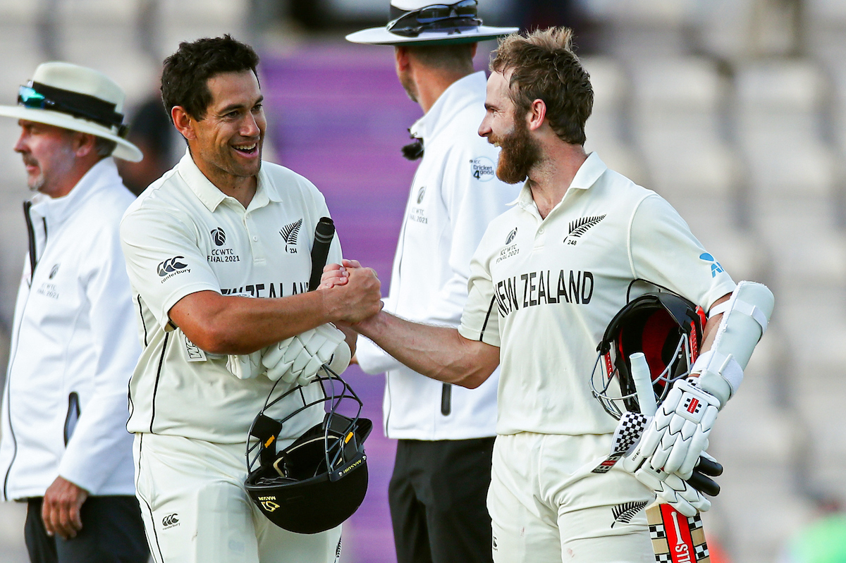 Ross Taylor (left) and Kane Williamson celebrate victory in the World Test Championship final against India. Photo / Matthew Impey, Pphotosport