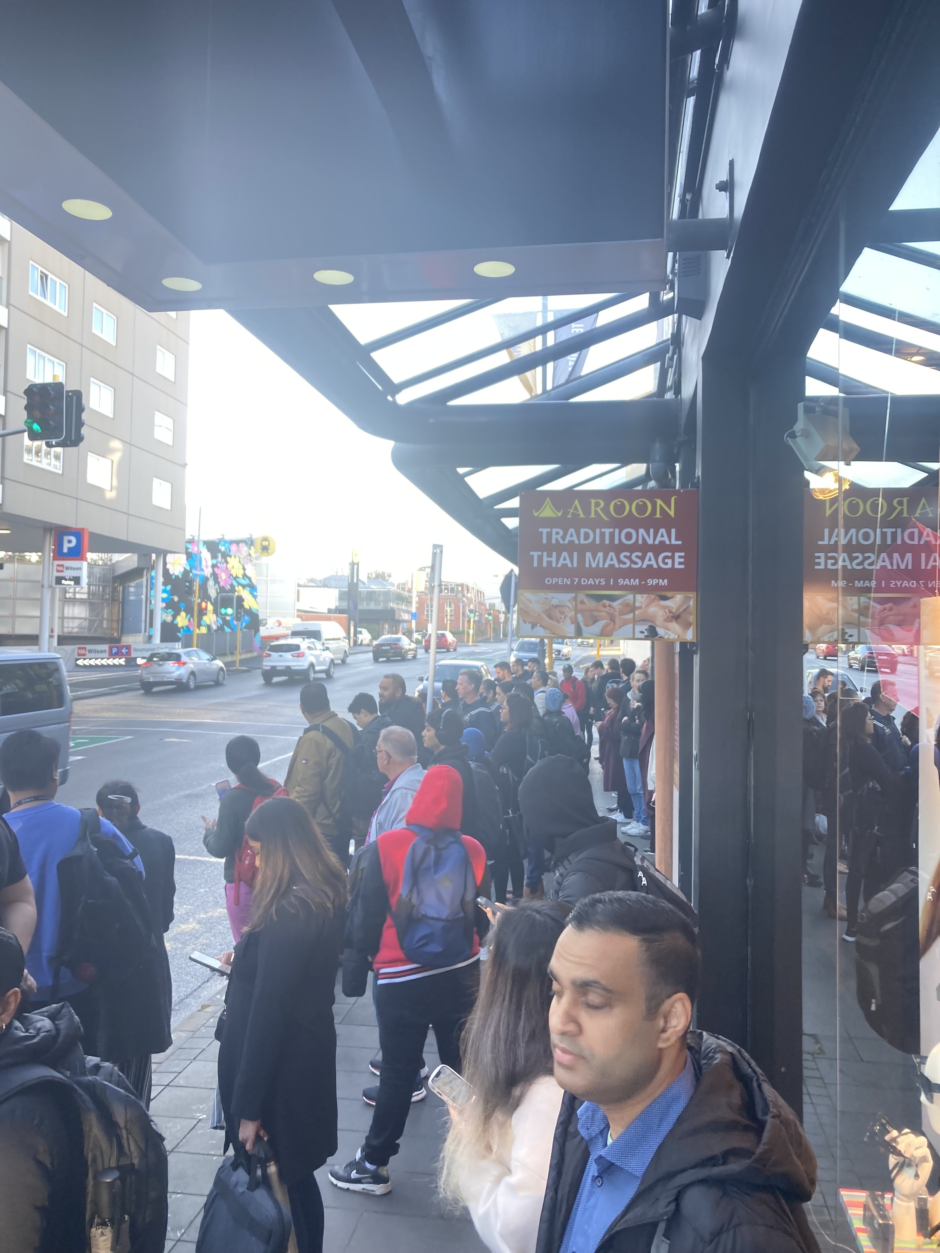 Commuters queue for replacement rail buses at Newmarket amid delays across Auckland's rail network. Photo / Lane Nichols