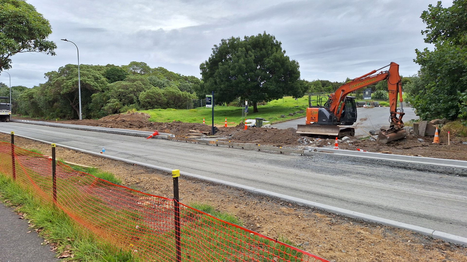 Meola Rd has been narrowed for motorists, and a two-way cycleway is being built.