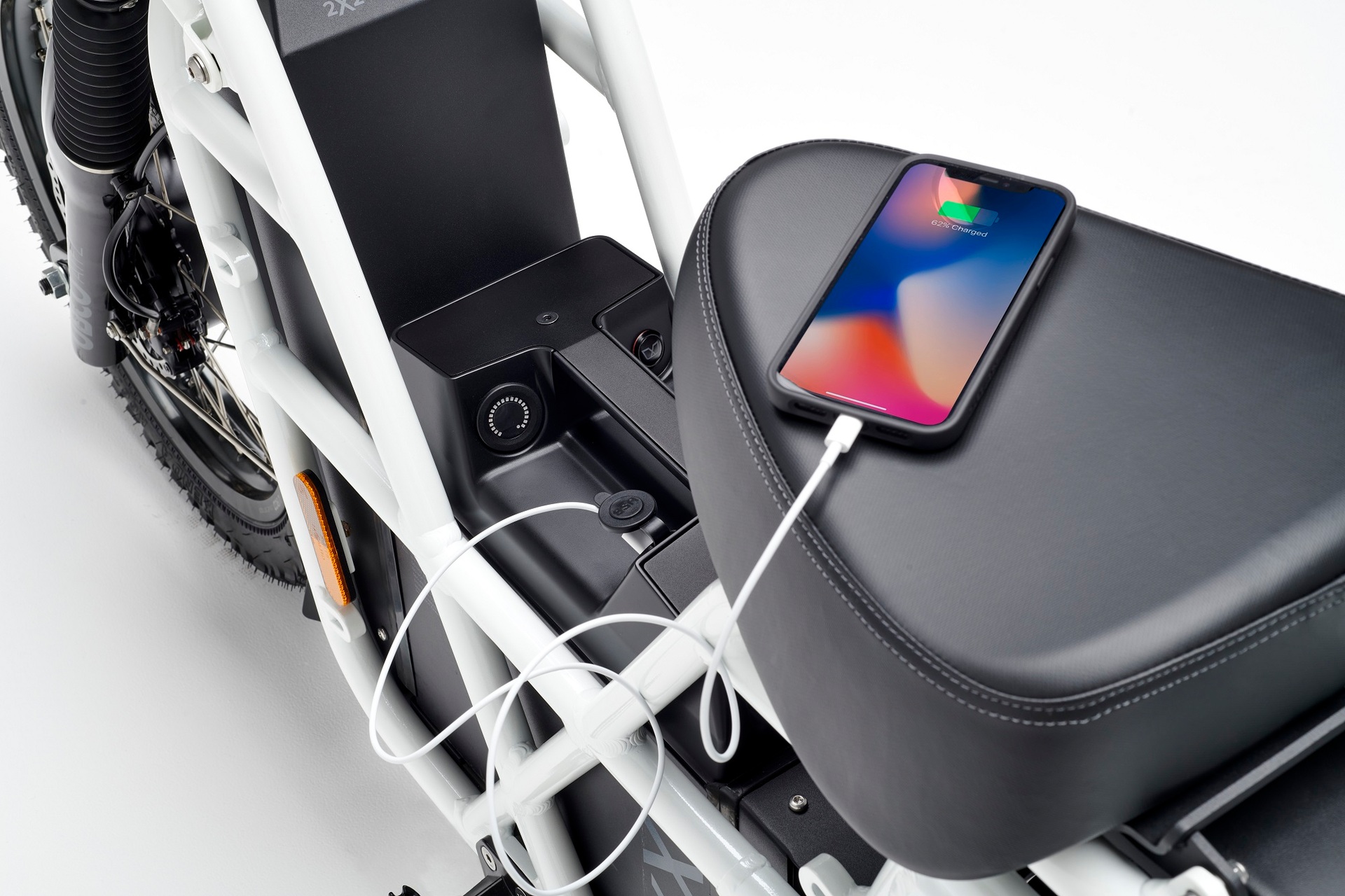 Ubco's coming battery console will make it easy for urban riders to charge their smartphone, just as rural riders use the electric motorbike's battery to charge power tools today. Photo / Supplied