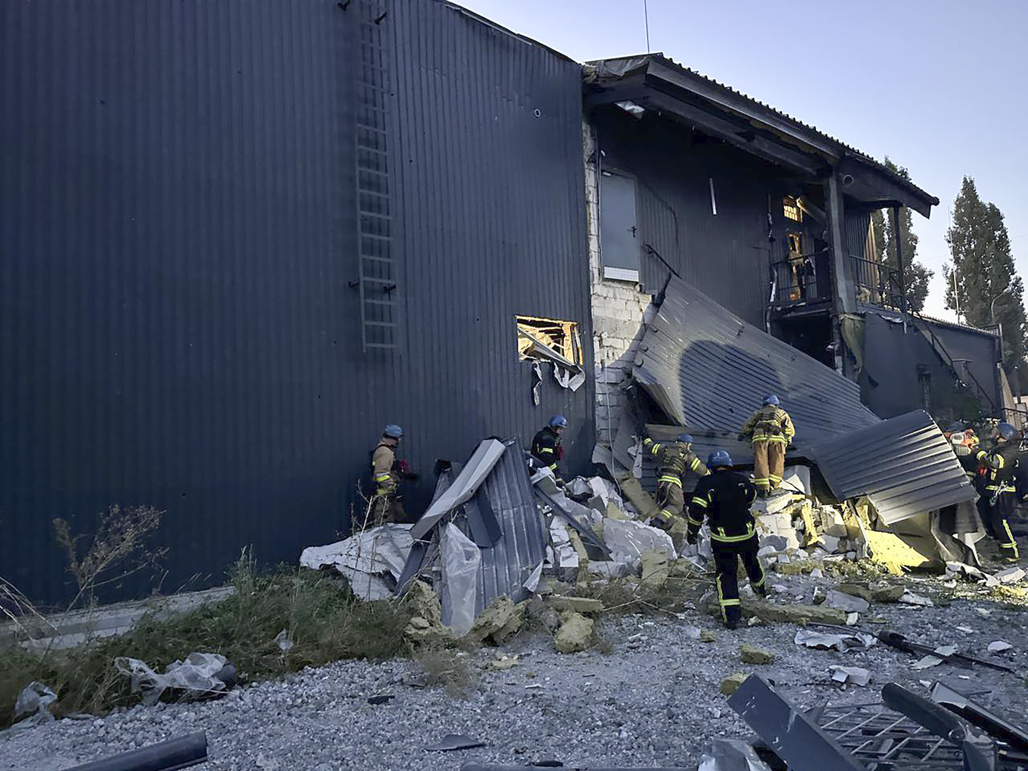 In this photo provided by the Zaporizhzhia administration Press Office, rescuers work on the scene of a building damaged after Russian missile strikes in Zaporizhzhia, Ukraine. Photo / AP
