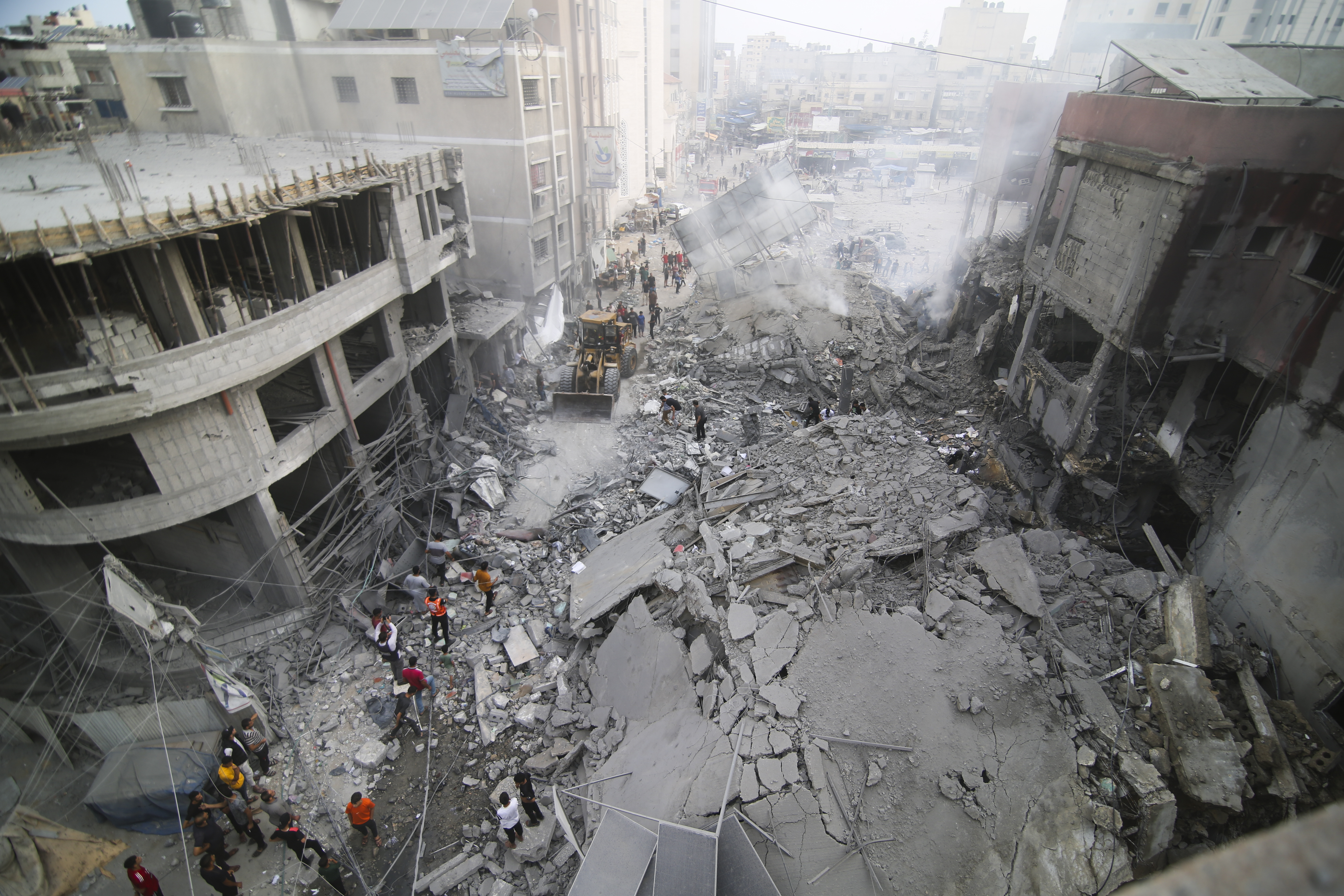 Palestinians inspect the damage of destroyed building after Israeli airstrikes in Khan Younis, Gaza Strip, earlier this week. 2023. Photo / AP
