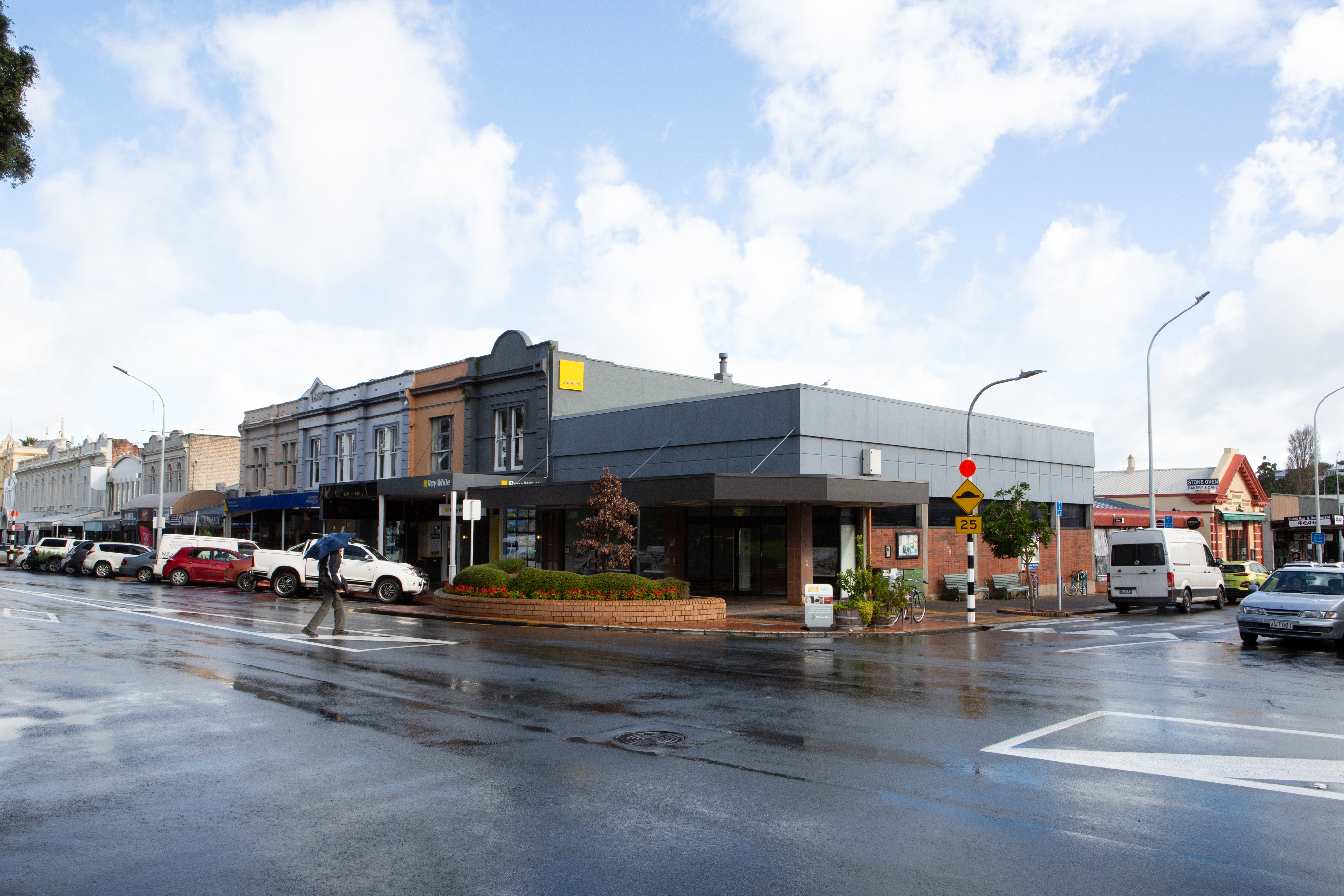 Ex-Westpac on the corner (grey roof) with other buildings the company is buyinig to the left. Photo / supplied