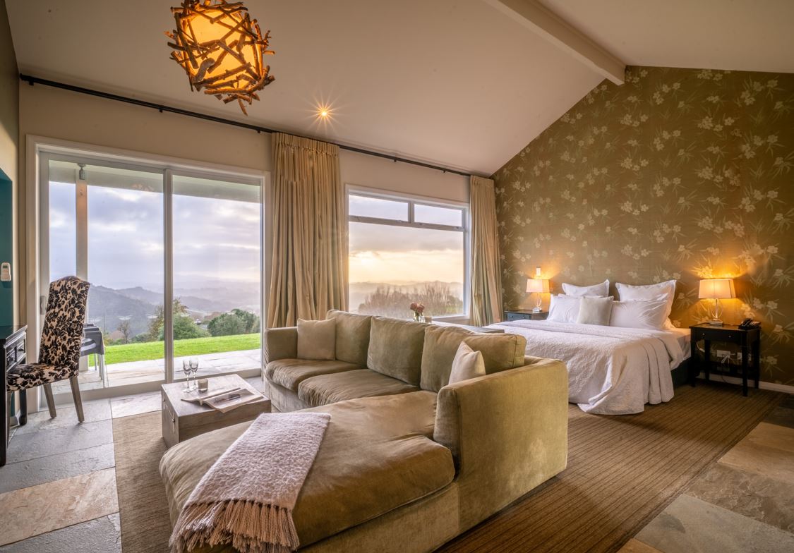 The space is sumptuous, with elaborate wallpaper and theatrical sky-high curtains. Photo / Supplied