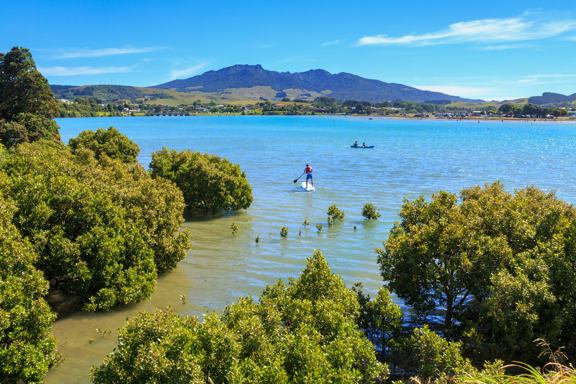 The pace is slower in Raglan, with incredible food, views and surf breaks guaranteed. Photo / 123rf