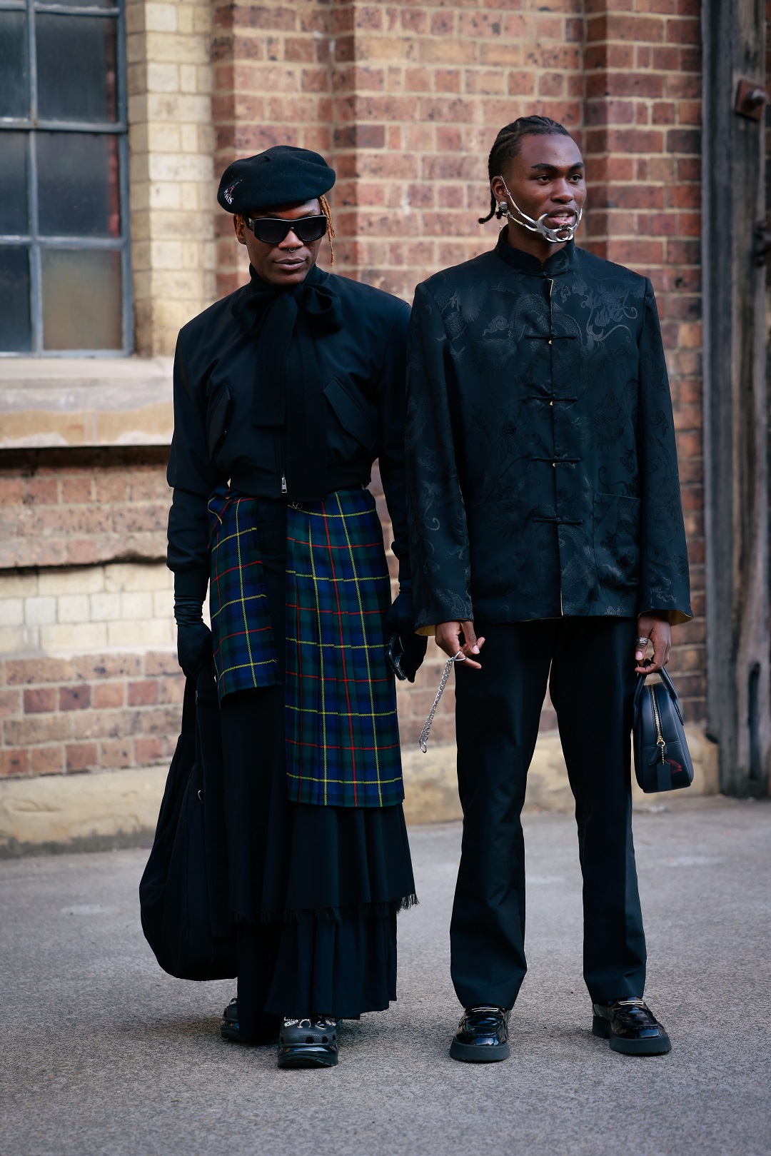 A guest wears a black qipao jacket to Australian Fashion Week. Photo / Hanna Lassen, Getty Images