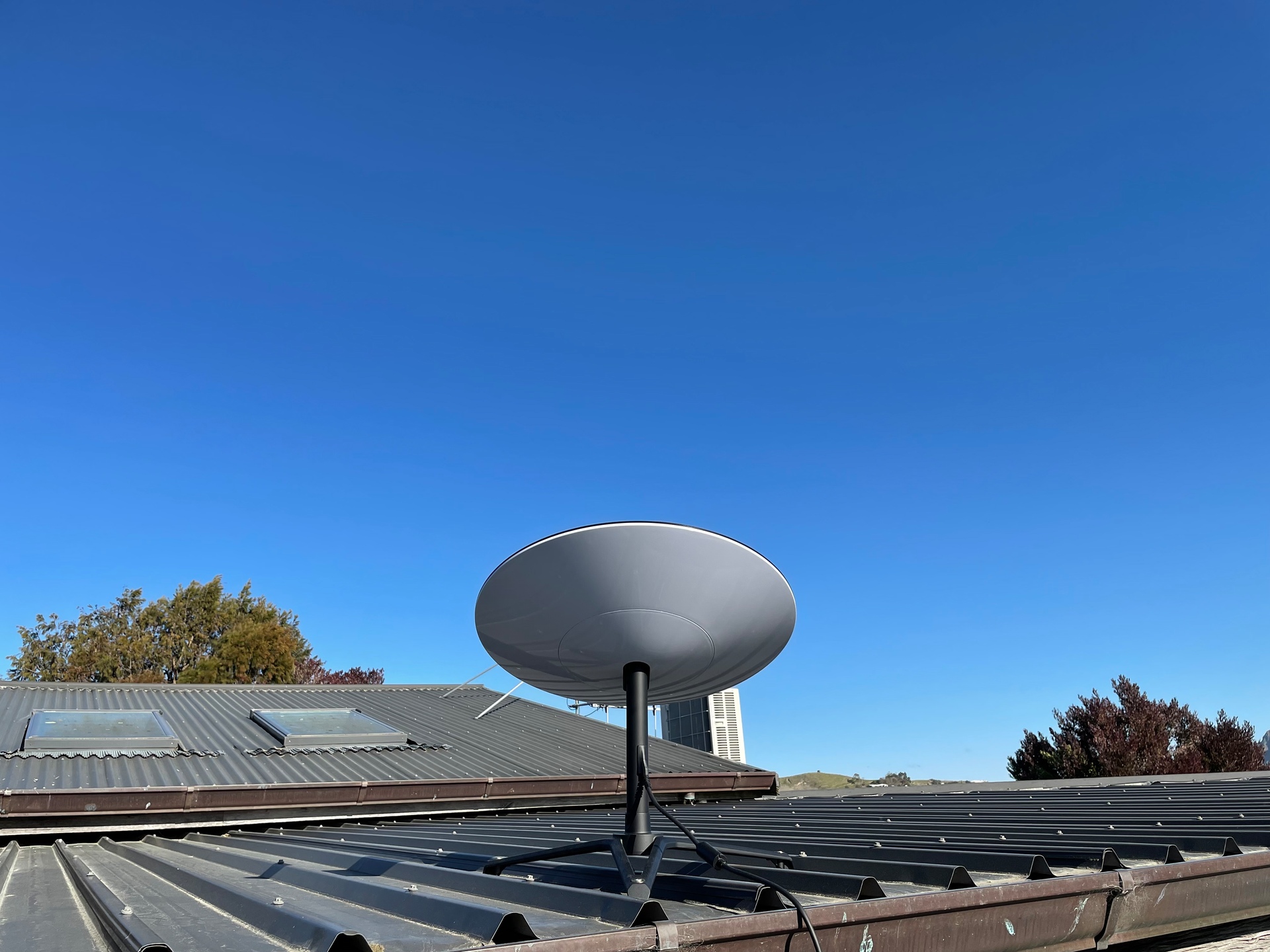 The Starlink dish on Hawkes Bay man Dave Frampton's roof. Install is DIY, with a smartphone app used for dish orientation. Photo / Supplied