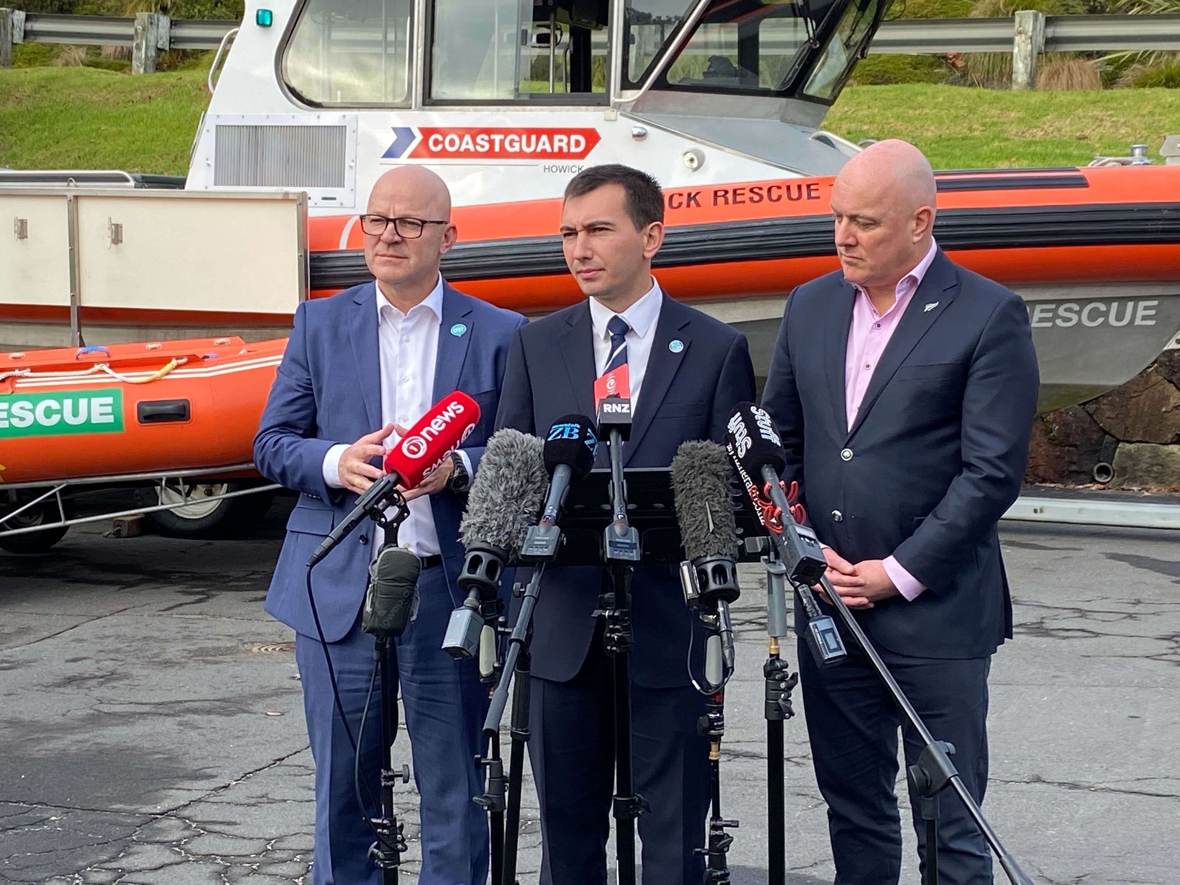 Prime Minister Christopher Luxon, right, Transport Minister Simeon Brown and Associate Transport Minister Matt Doocey, left, make a pre-Budget transport announcement about Surf Life Saving NZ and Coastguard NZ funding. Photo / Corey Fleming