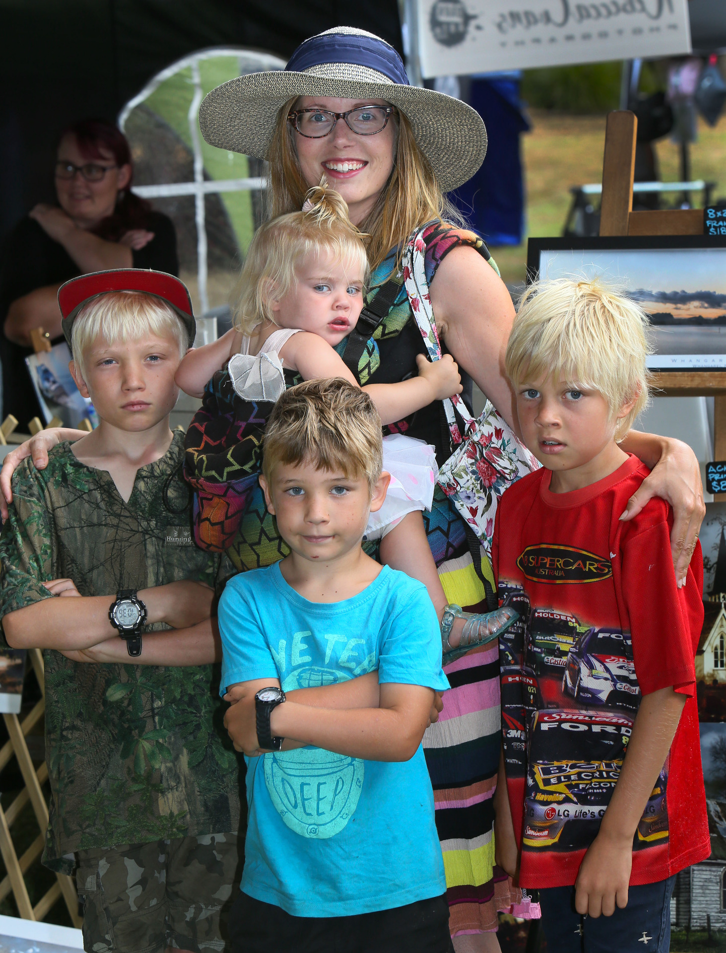 The Stone family are mum Esther holding one-year old Eva, with Thomas, 10, left, Nathaniel, 6, and Eilijah, 8