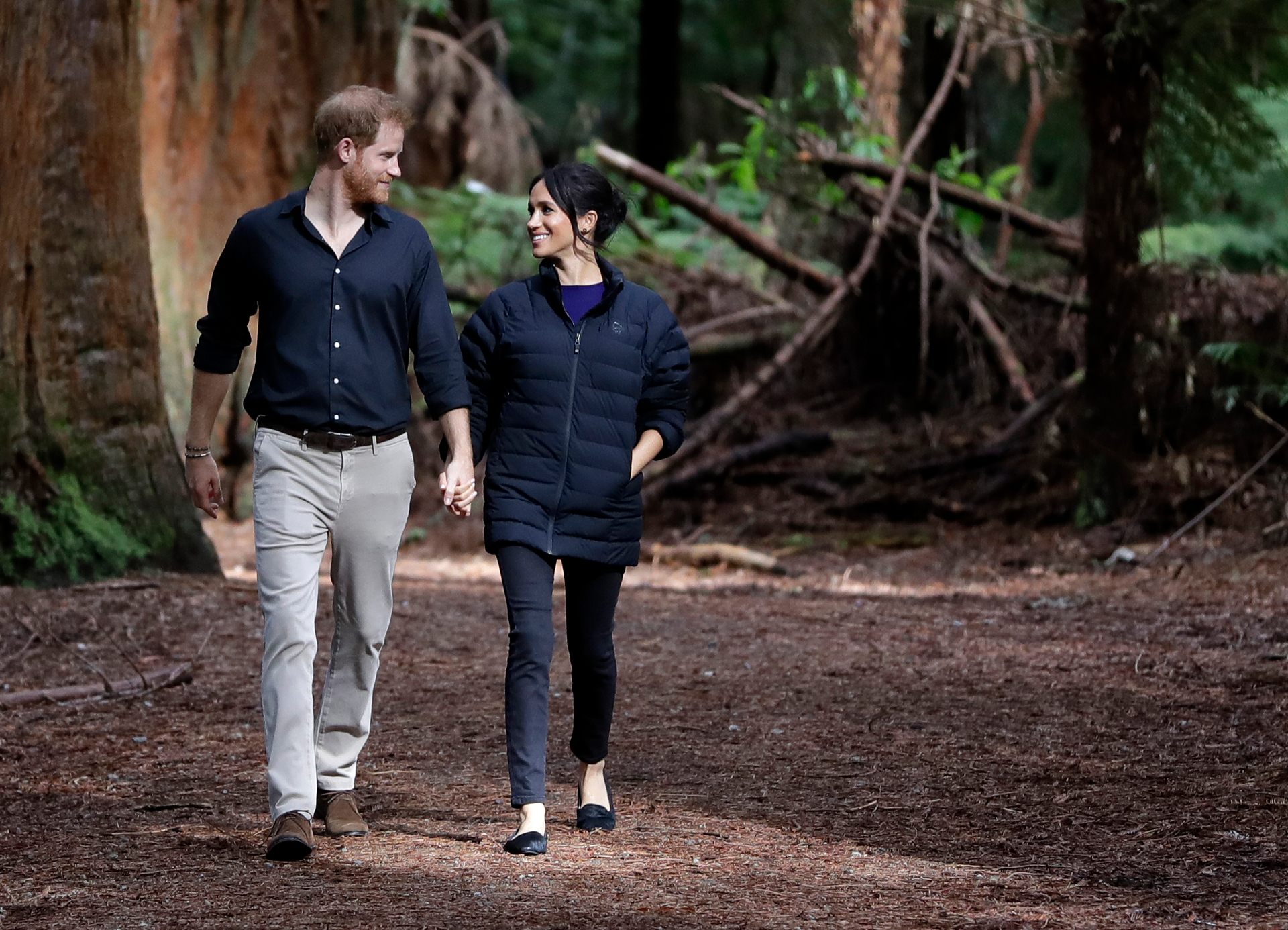 Prince Harry and Meghan, Duchess of Sussex walk through a Redwoods forest in Rotorua, New Zealand, Wednesday, Oct. 31, 2018. Photo / Dean Purcell
