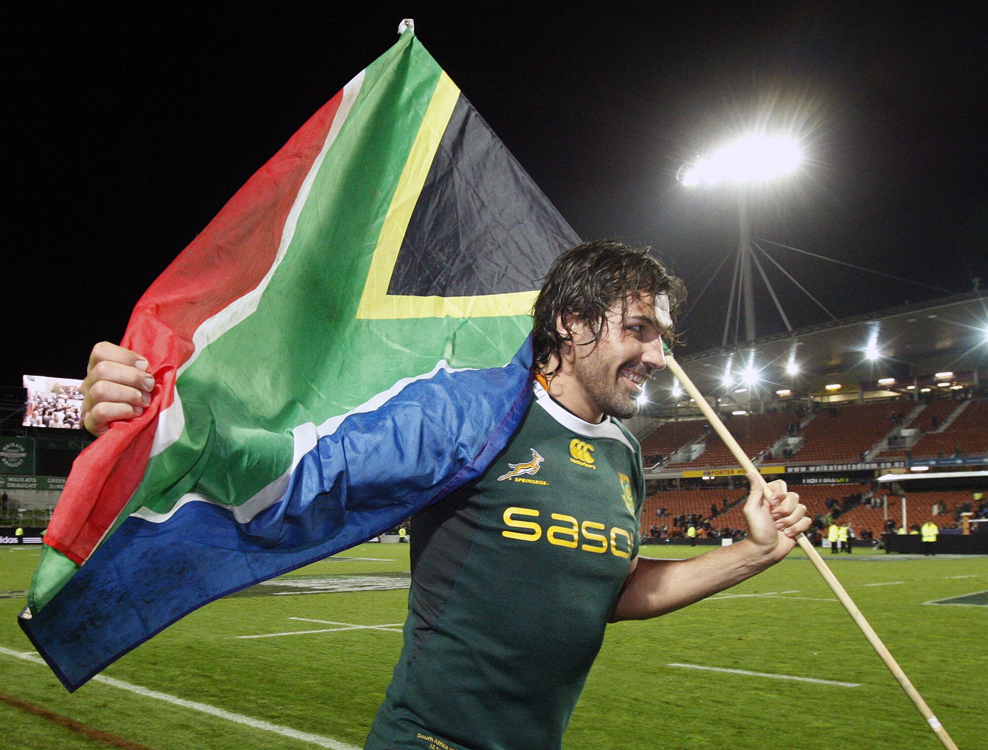 Springboks lock Victor Matfield celebrates victory with a South African flag in Hamilton. Photo / Sarah Ivey