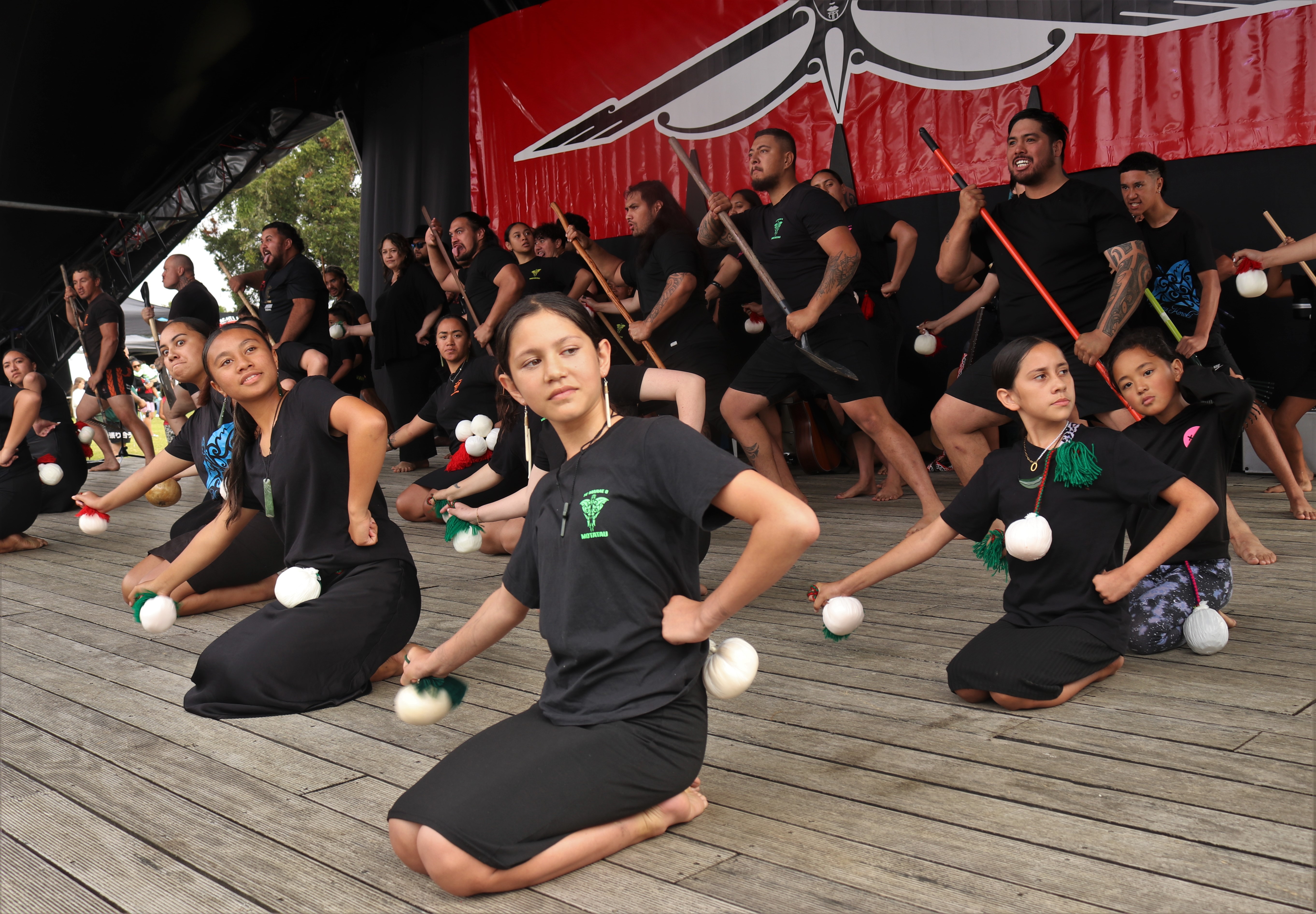 Arapera Taitaka, 11, performs the poi with Motatau Marae kapa haka group. Photo / Peter de Graaf