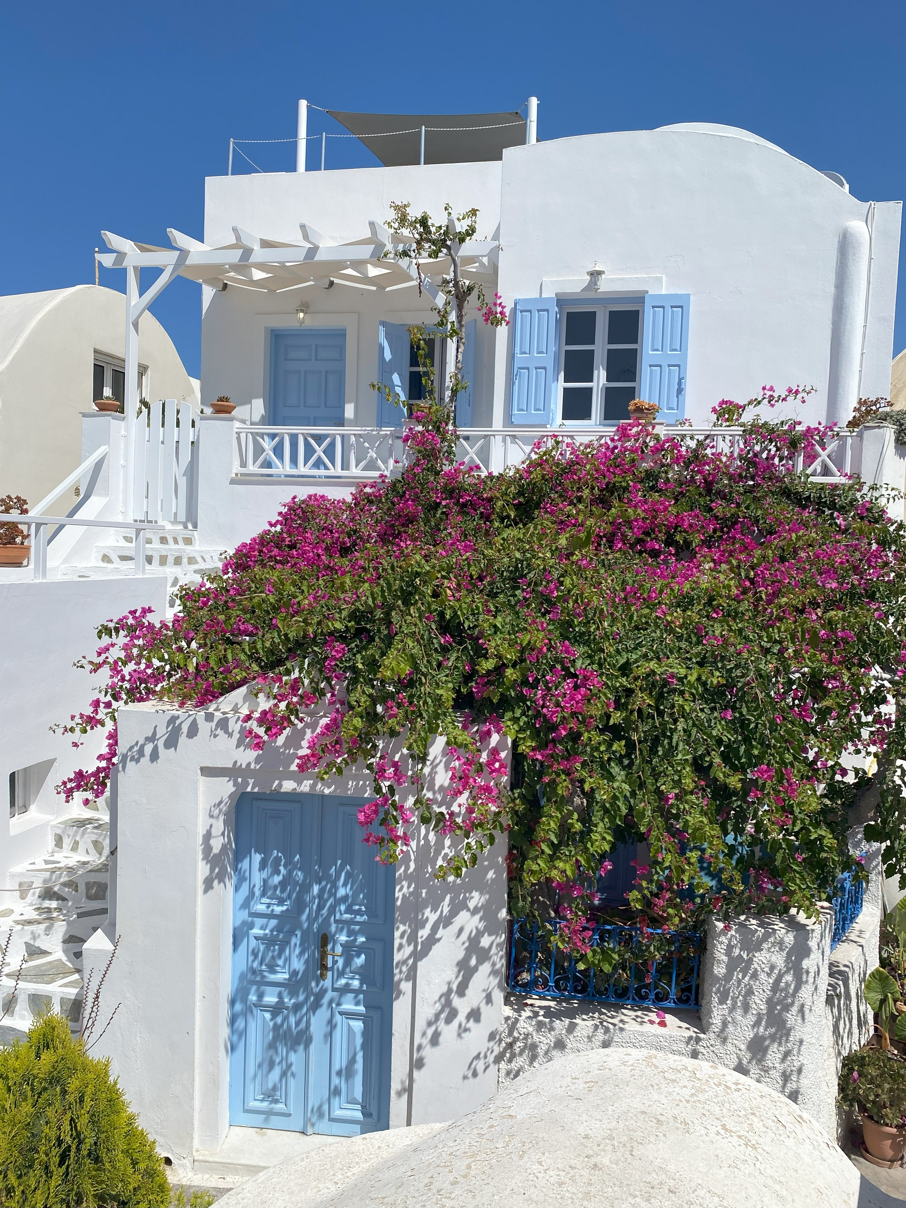 A blue-shuttered house in Oia, Santorini. Photo / Johanna Thornton