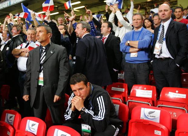 Non-playing All Black back Aaron Mauger sits alone on the All Black bench after the 2007 Rugby World Cup quarter-final. Photo / Brett Phibbs
