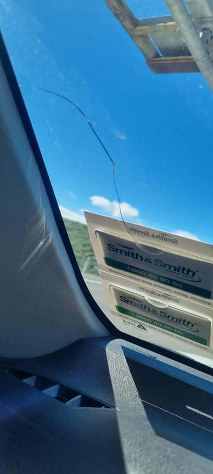 One driver's cracked windscreen after travelling Transmission Gully today. Photo / Supplied