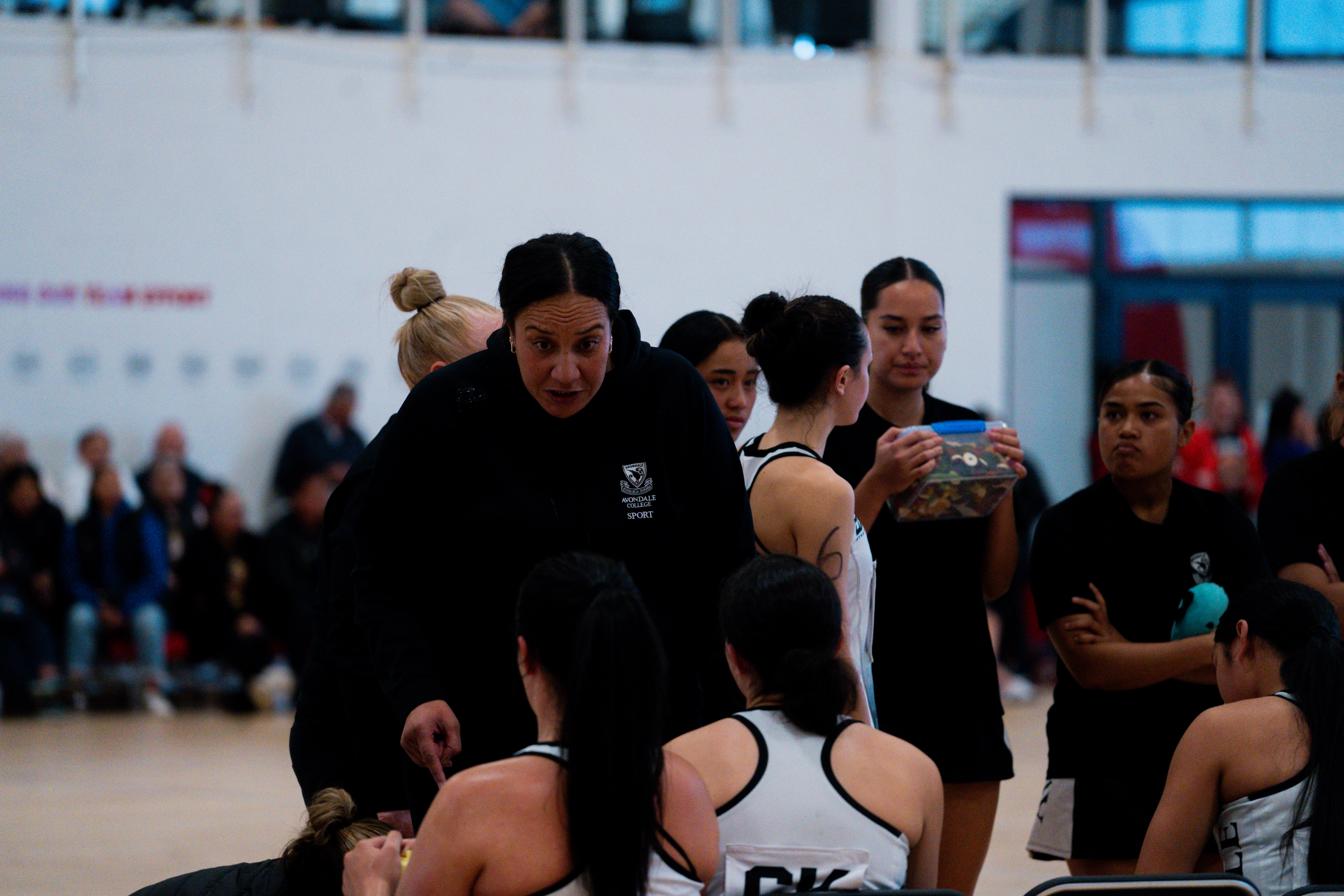 Avondale College coach and former Silver Fern, Rachel Rasmussen, issuing instructions for her defenders in between quarters. Photo / Netball New Zealand