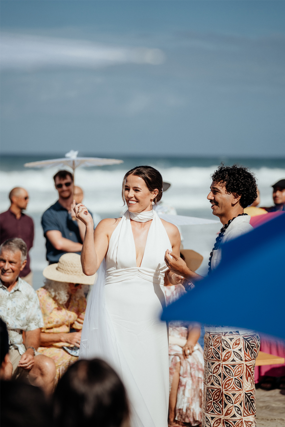 Hayley's wedding dress was by Clara Bridal, while Connor wore a linen shirt and i’e faitaga. Photo / Geoffery Matautia and Hele Ikimotu.