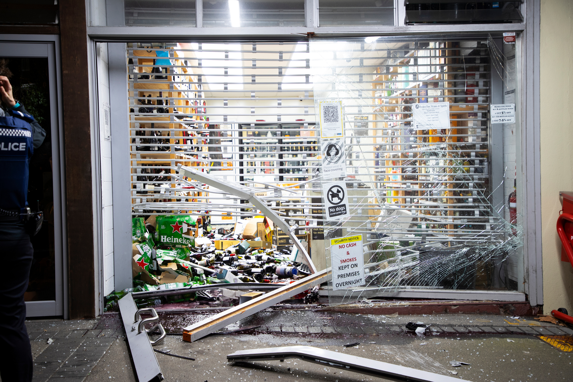 The damage from a ram raid at Orakei Fine Wines & Spirits in Orakei. Photo / Hayden Woodward. 

