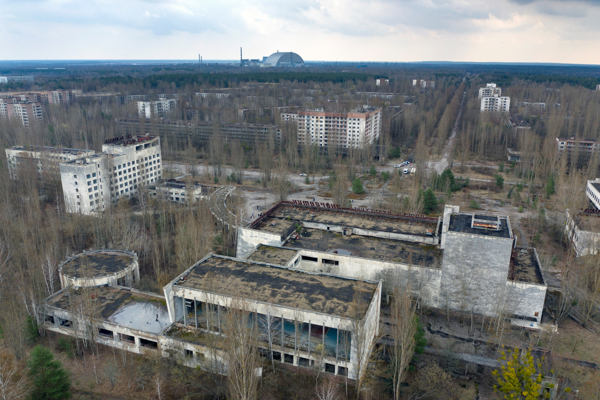 A view of the ghost town of Pripyat with a shelter covering the exploded reactor at the Chernobyl nuclear plant in the background. Photo / AP