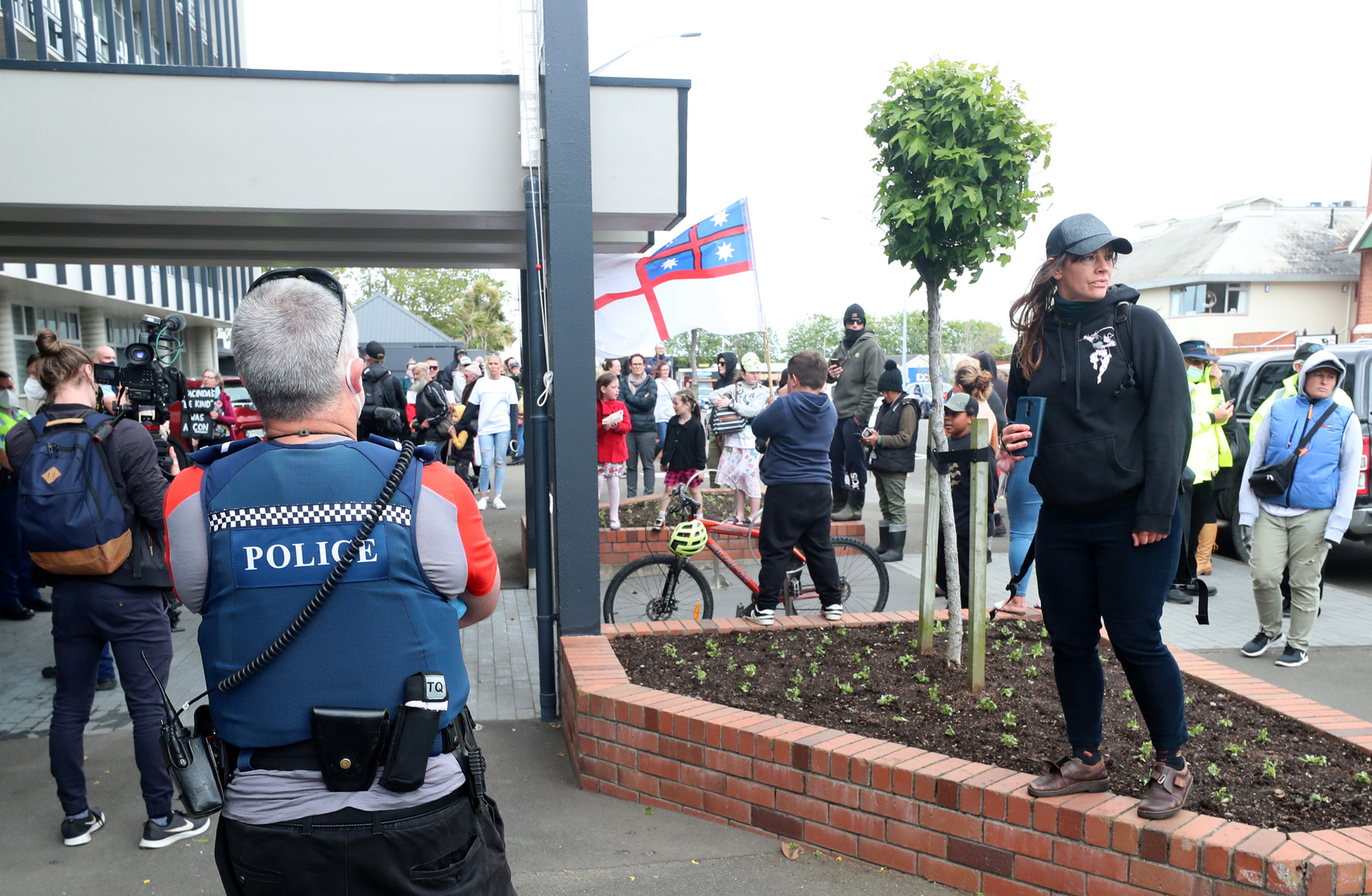 People gather outside the Whanganui District Council. Photo / Bevan Conley