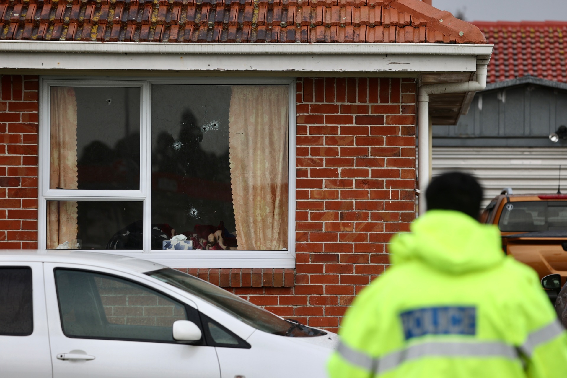 Neighbours say those inside the Albert Rd home ducked for cover as the shooter opened fire. Photo / George Heard