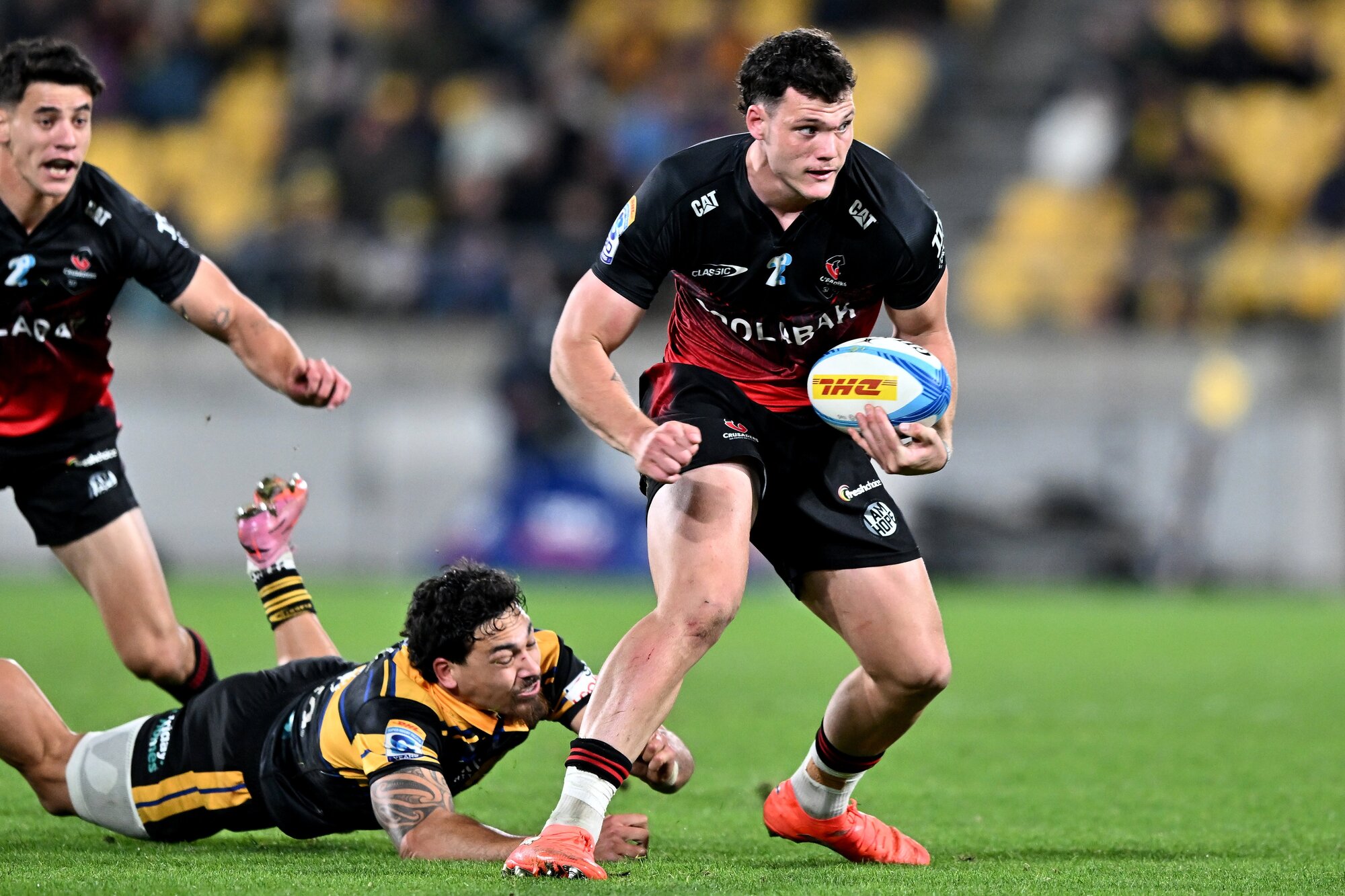 Kurtis Macdonald make a break for the Crusaders against the Hurricanes. Photo / Photosport