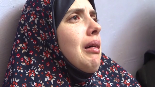 Rania Abu Anza mourns her twins, who were killed in an Israel strike on a house in Rafah. Photo / AP