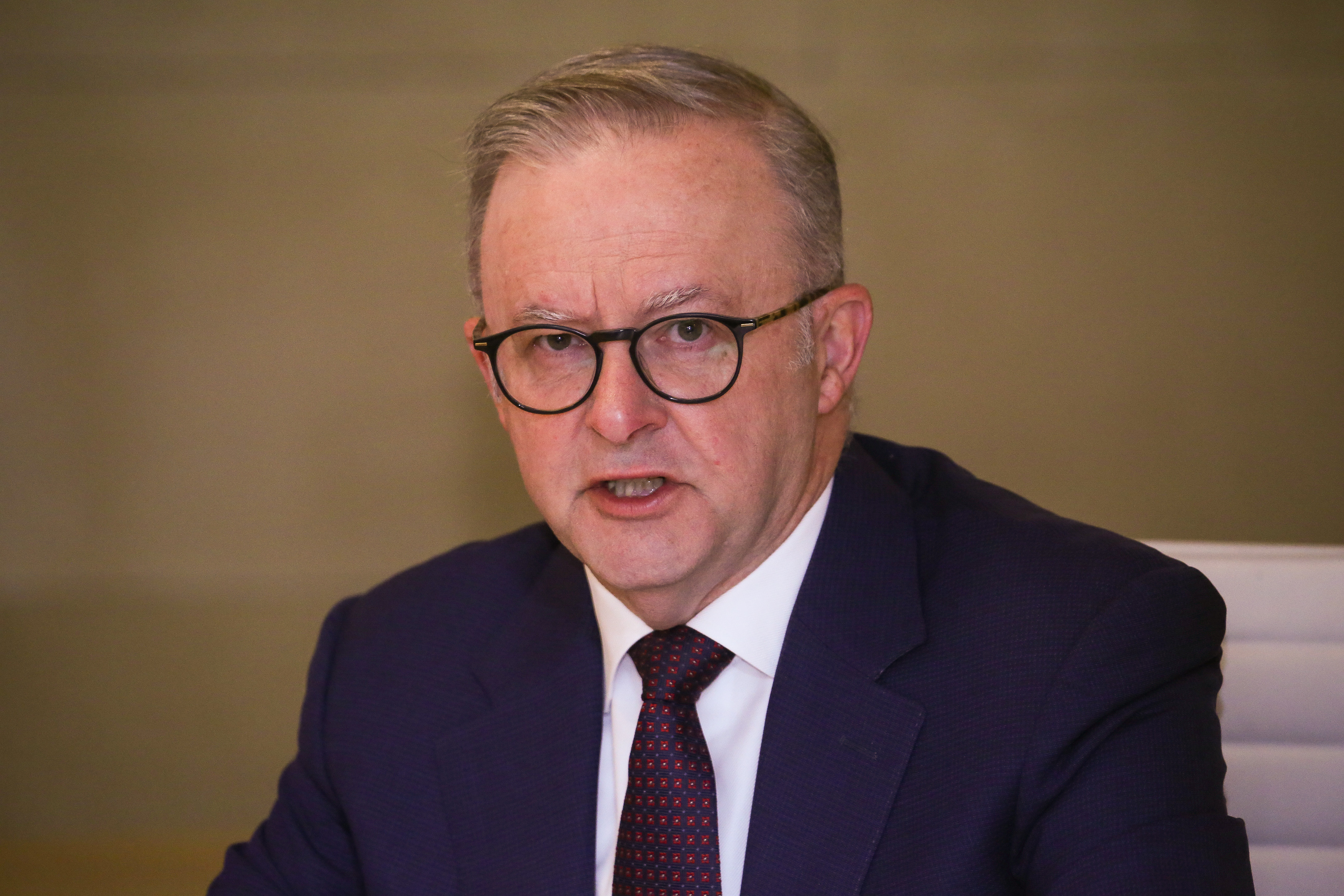 Anthony Albanese wanted young Australians 'off their phones and onto the footy and cricket field, the tennis and netball courts, in the swimming pool'. Photo / Getty Images
