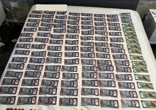 A large amount of cash was also seized.