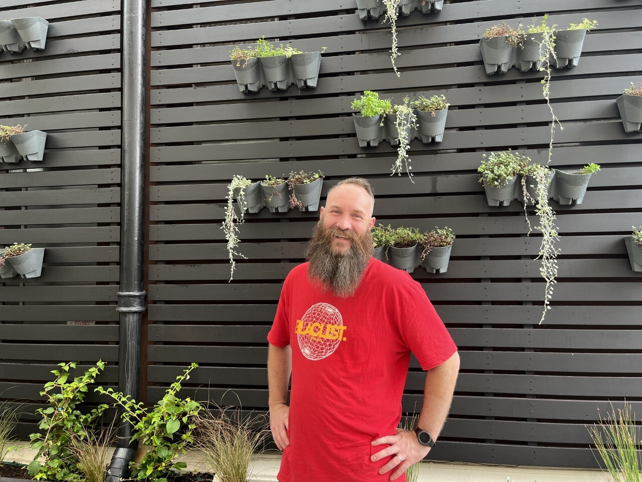 Sam Tarrant in the courtyard of his new venue.