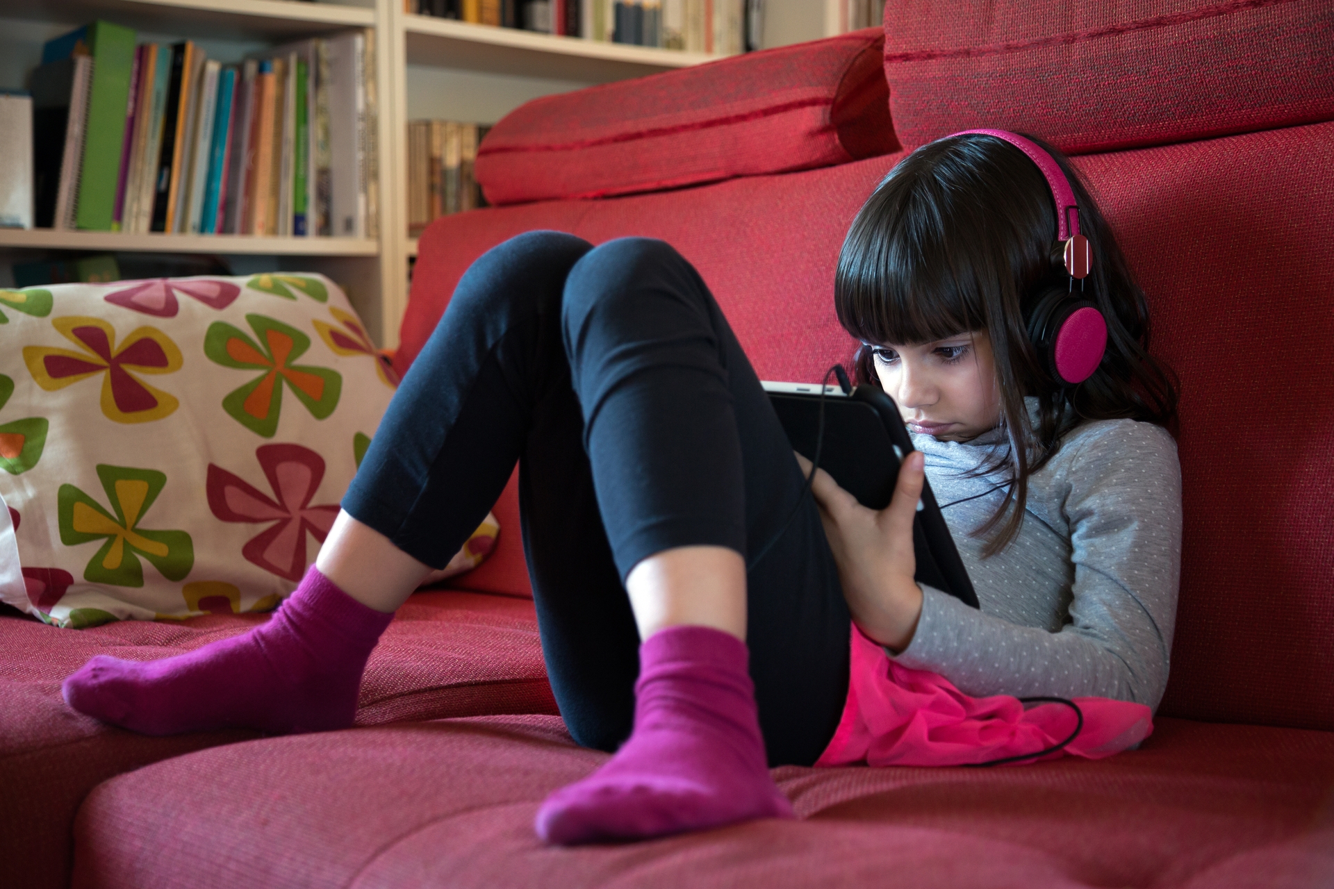 Try to steer kids towards educational apps, TV programmes and video games instead of focusing on screen time limits. Photo / 123RF