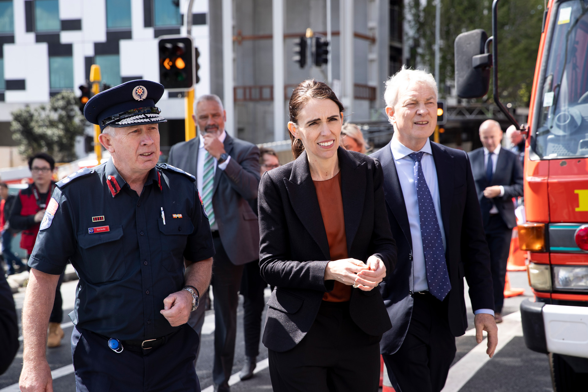 Former prime minister Jacinda Ardern takes a tour of the burning New Zealand International Convention Centre with Mayor Phil Goff and Fire and Emergency's Ron Devlin in 2019. Photo / Dean Purcell
